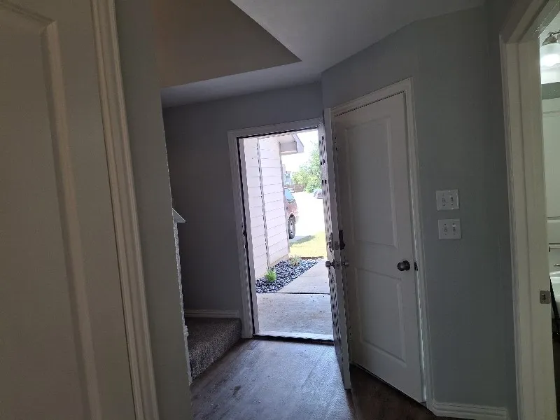 Foyer entrance with baseboards
