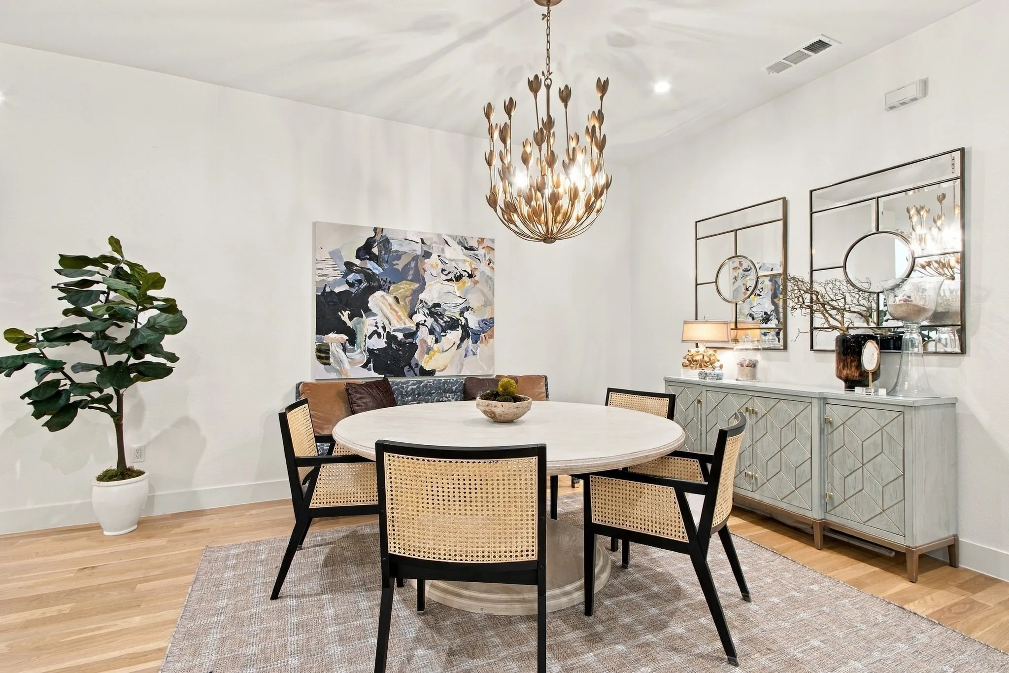Hardwood-finish flooring, recessed lighting, and a decorative ceiling fixture