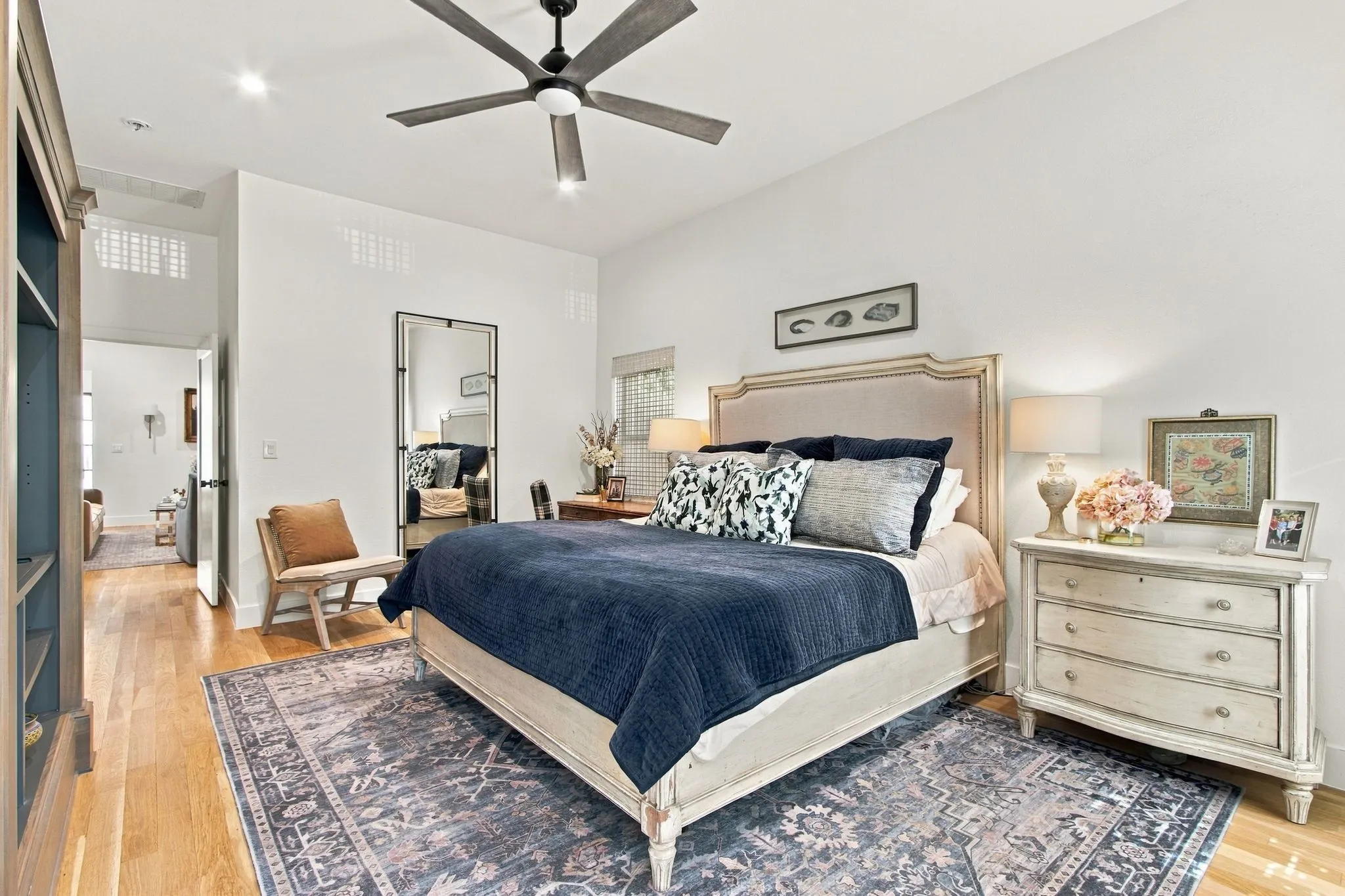 Hardwood flooring, recessed lighting, and a ceiling fan with integrated lighting