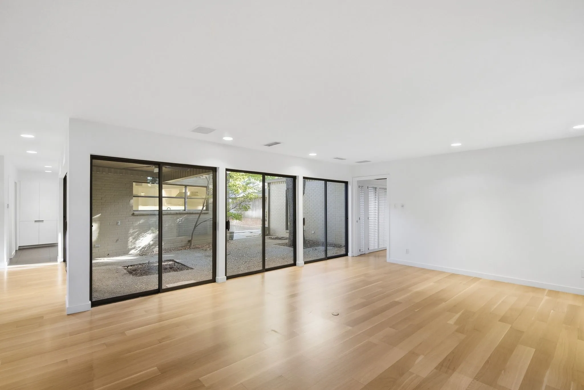 Living Room leads to Primary Suite