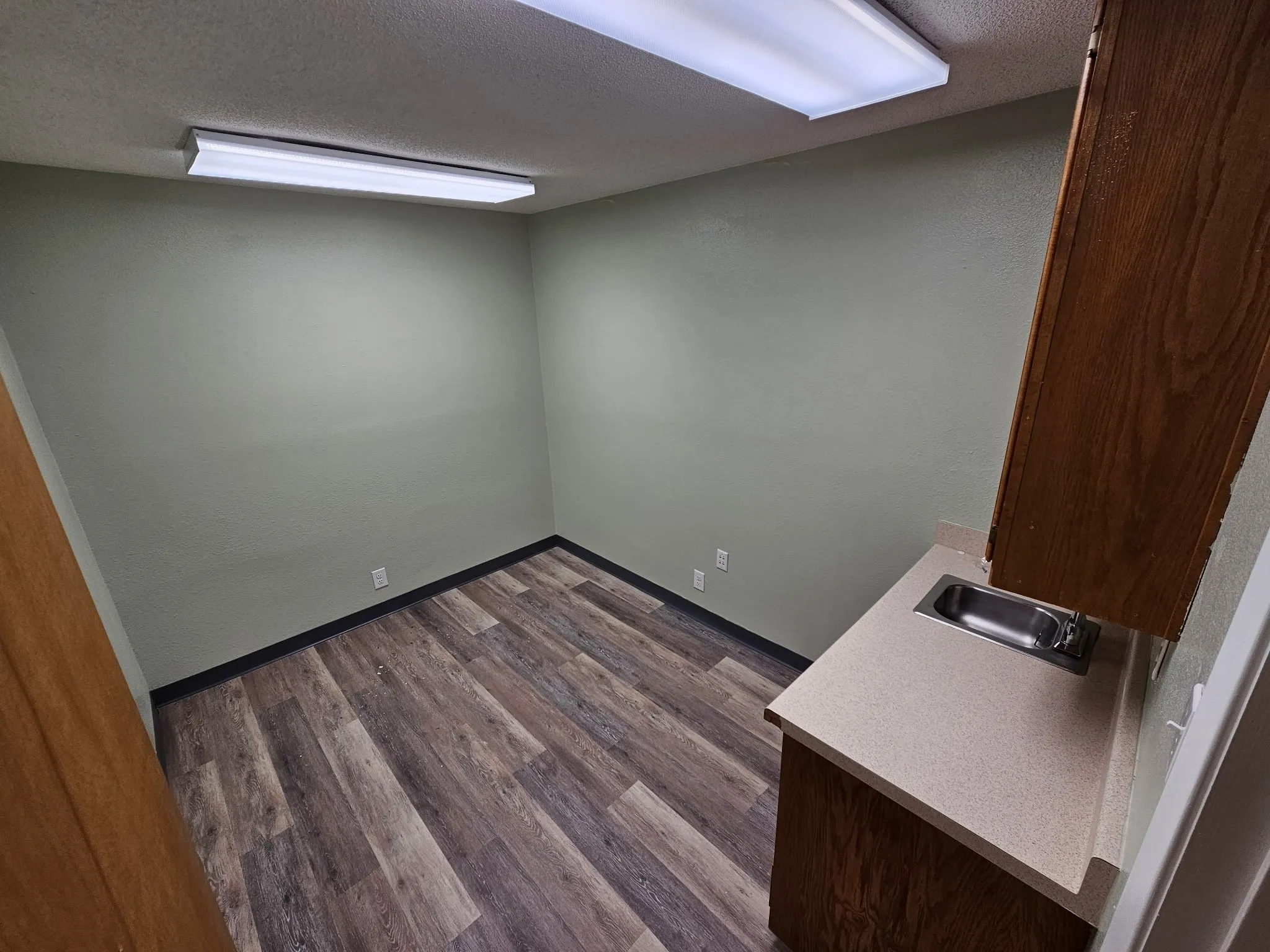 Exam Room #2 with cabinets and sink