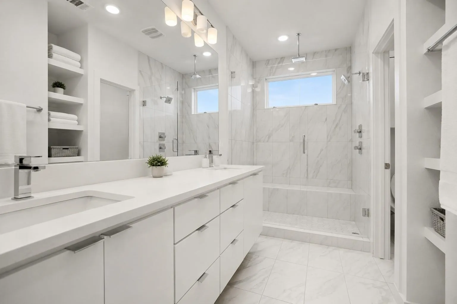Dual vanity with integrated sinks and white countertops