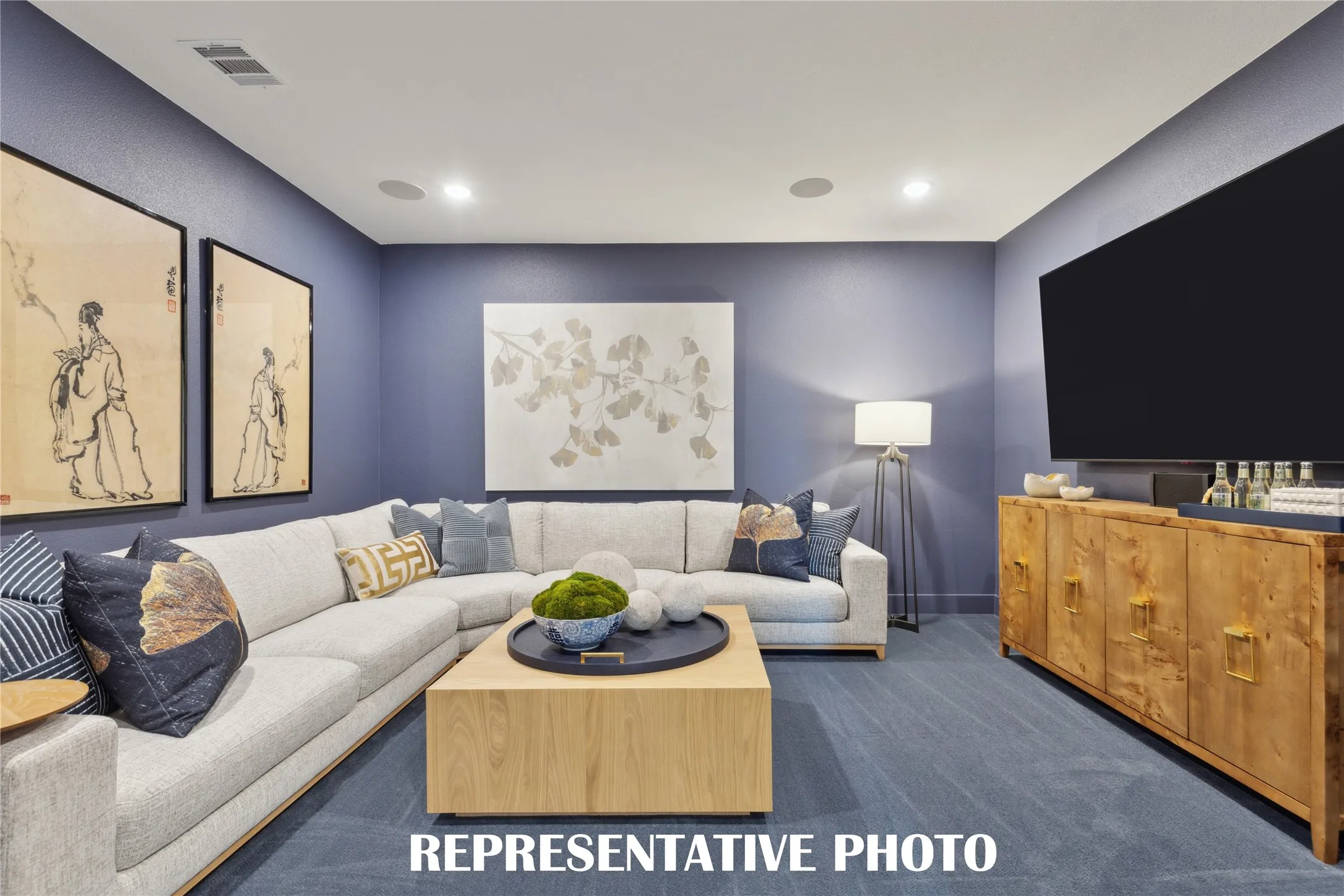 This over the top media room and adjacent game room create the ultimate entertainment zone!  REPRESENTATIVE PHOTO