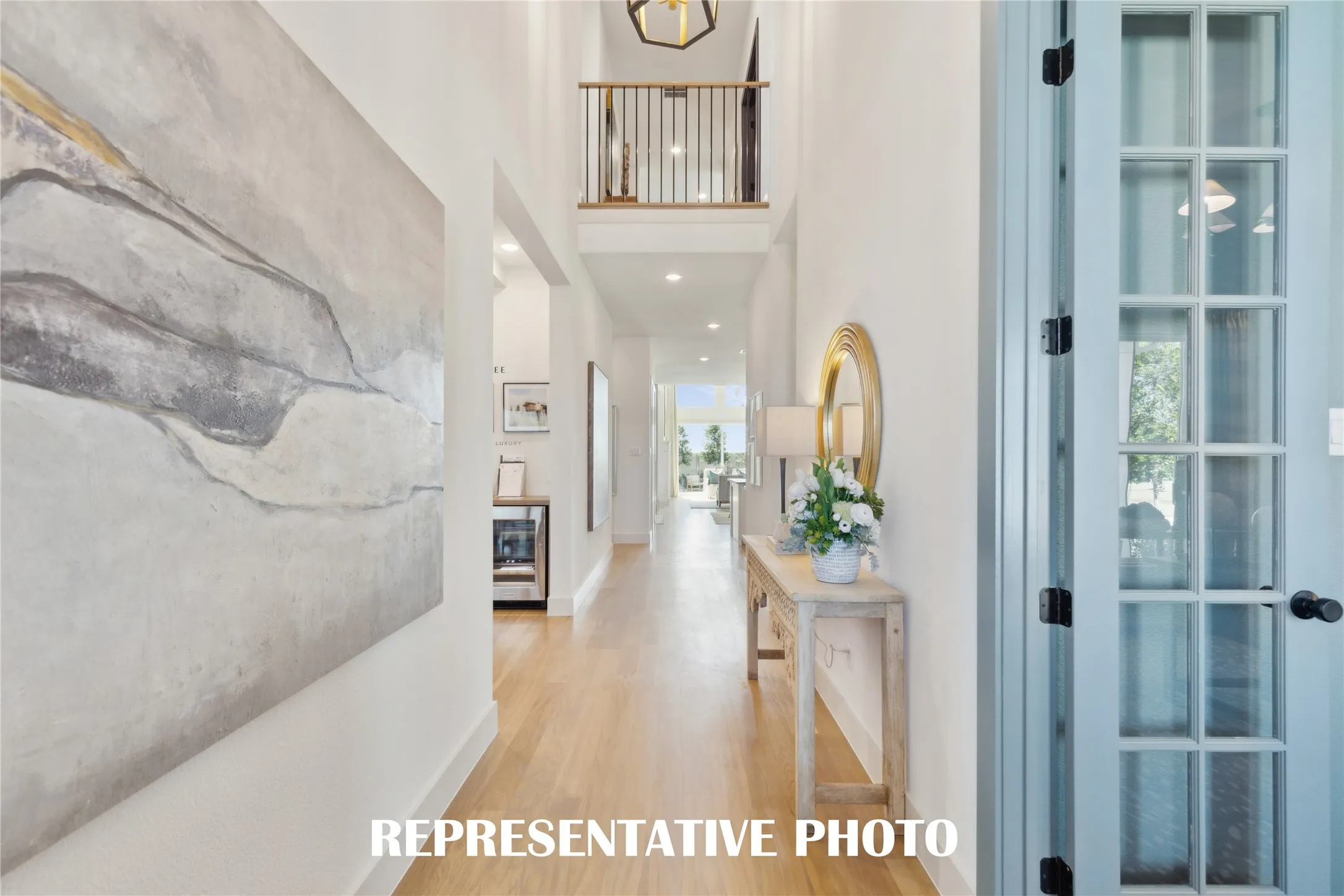 With site lines from the front through to the rear of the home, this lovely entry is the prefect place to welcome friends and family into your dream home!  REPRESENTATIVE PHOTO
