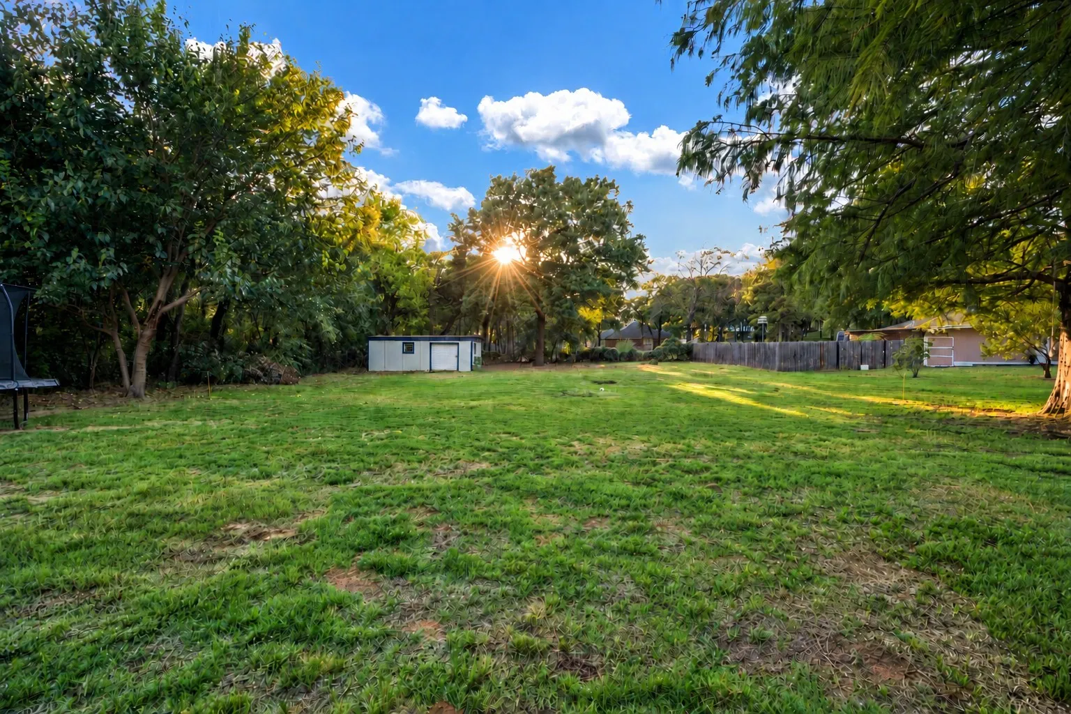 facing to the back yard showing the shed.