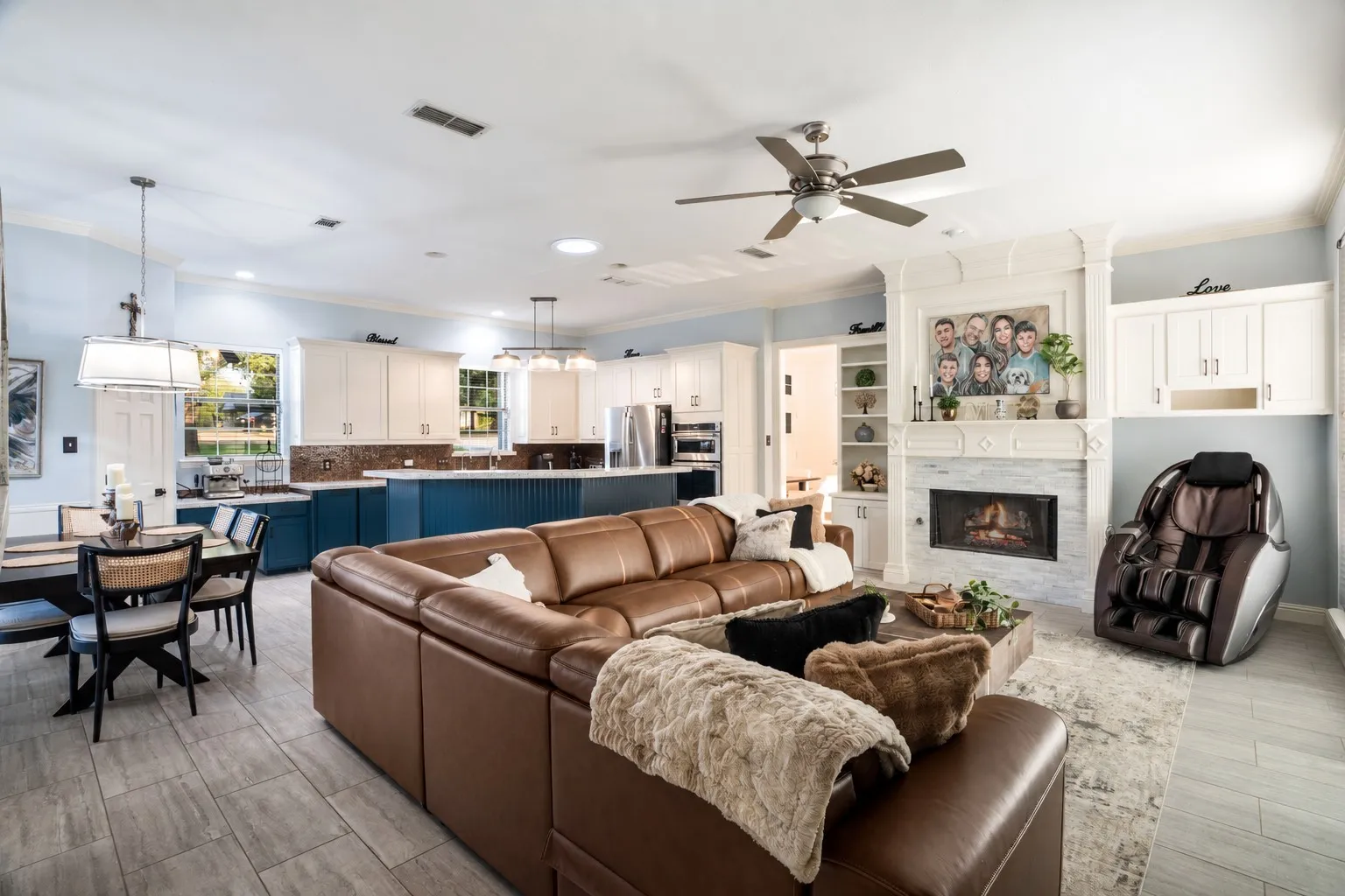 Second living area off of the kitchen.  Room has double doors that go out the the pool area.