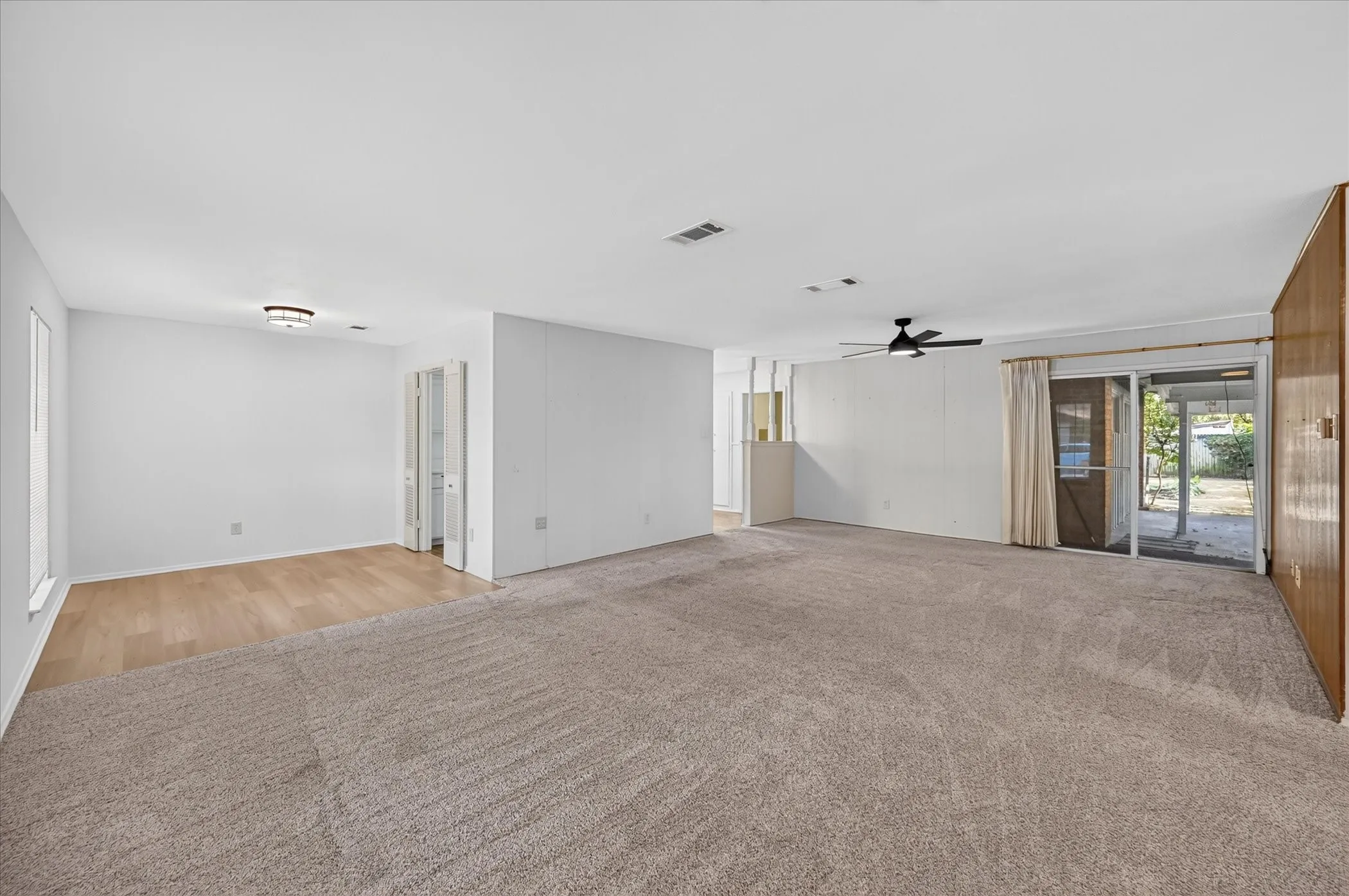 Spacious living room that opens to a dining area