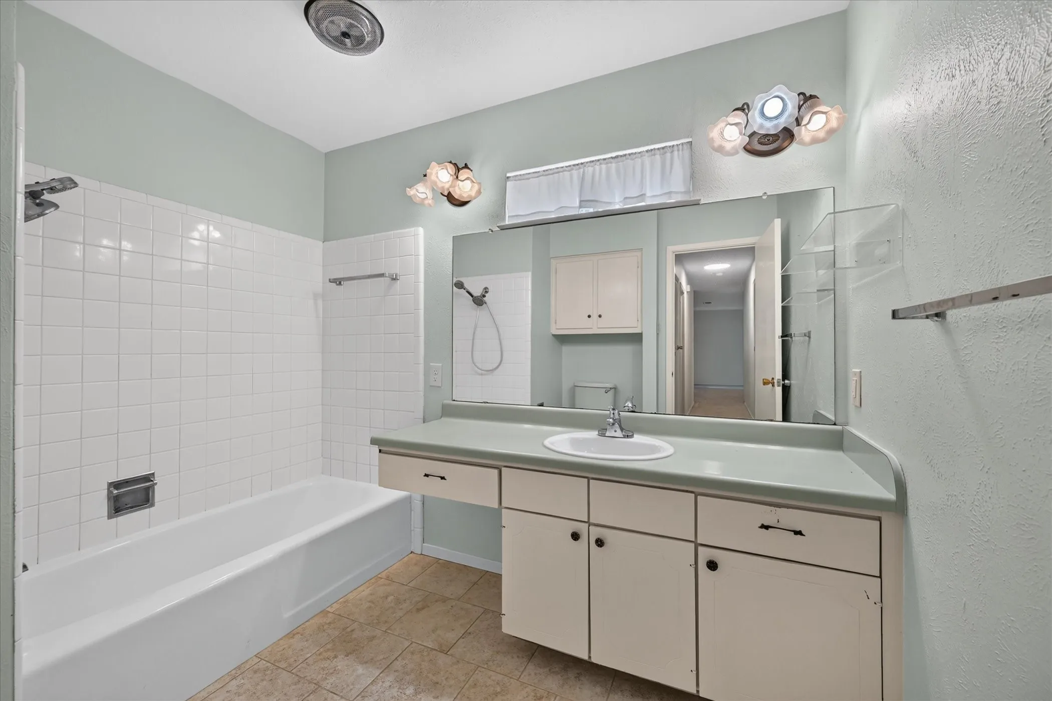 Bathroom at the end of the hall for guests and 2 bedrooms