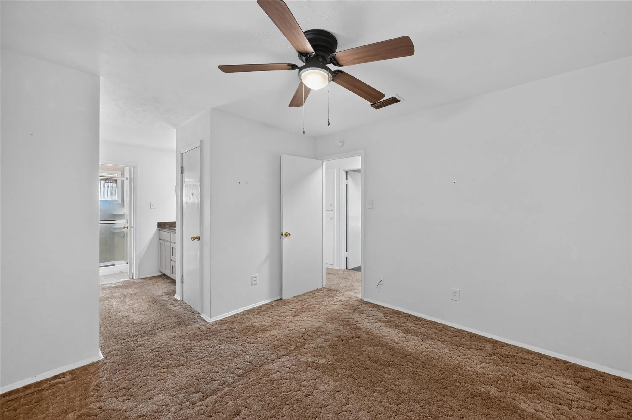 Primary bedroom with ensuite bathroom