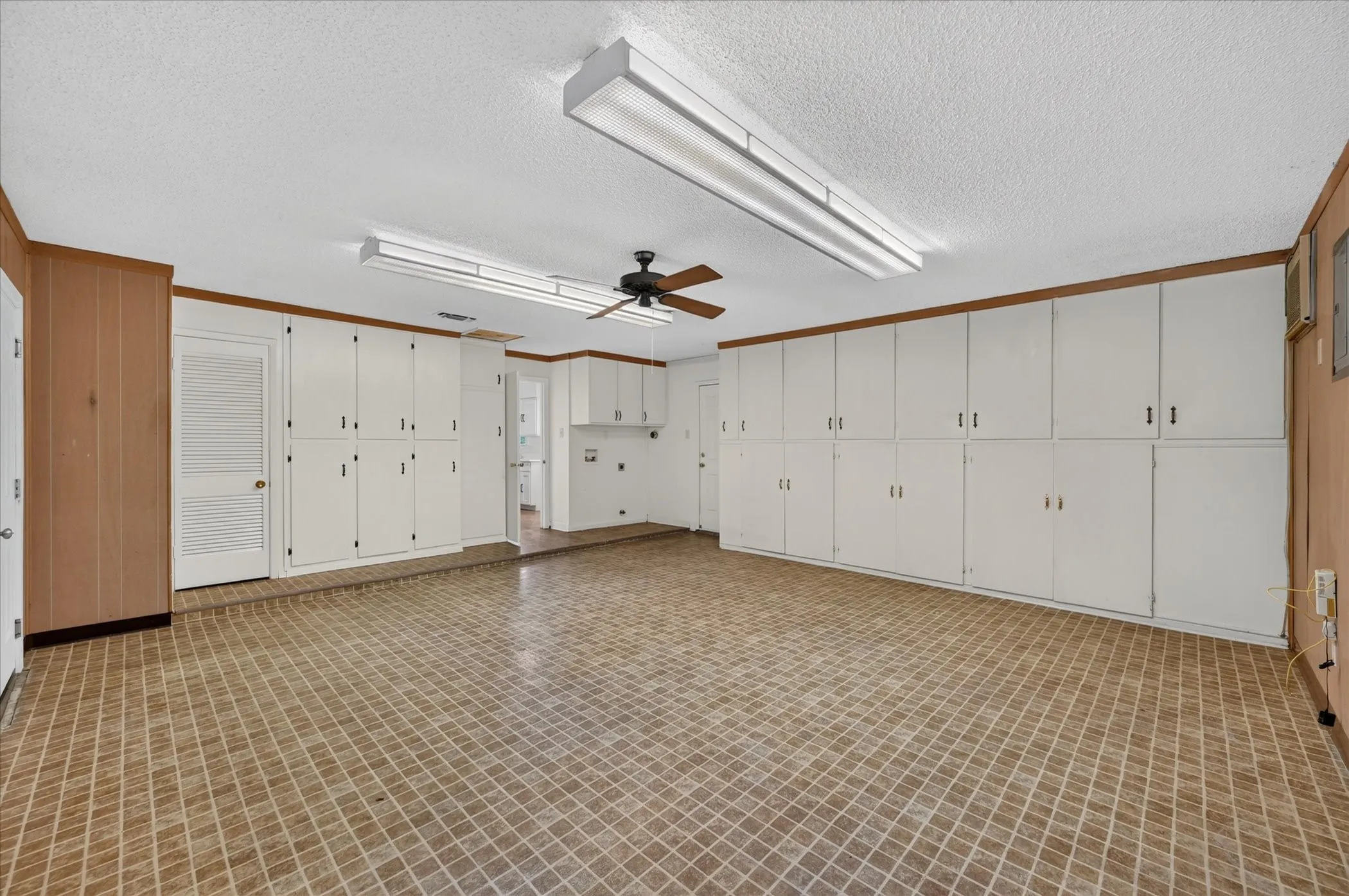 Incredibly versatile bonus room with tons of storage.