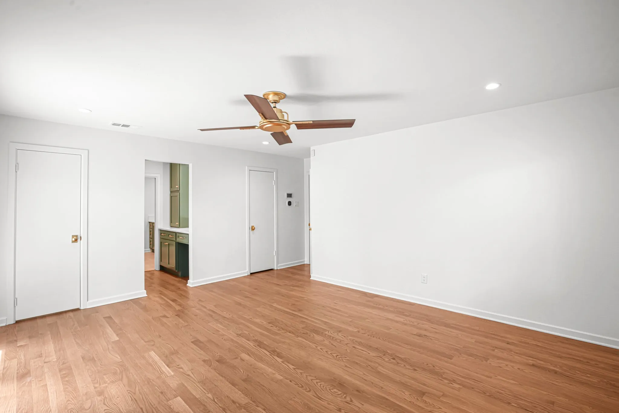 Primary Suite was taken to the studs and reimagined with great attention to detail - hardwood flooring, dual closets, separate vanity area and private entry to gorgeous backyard!