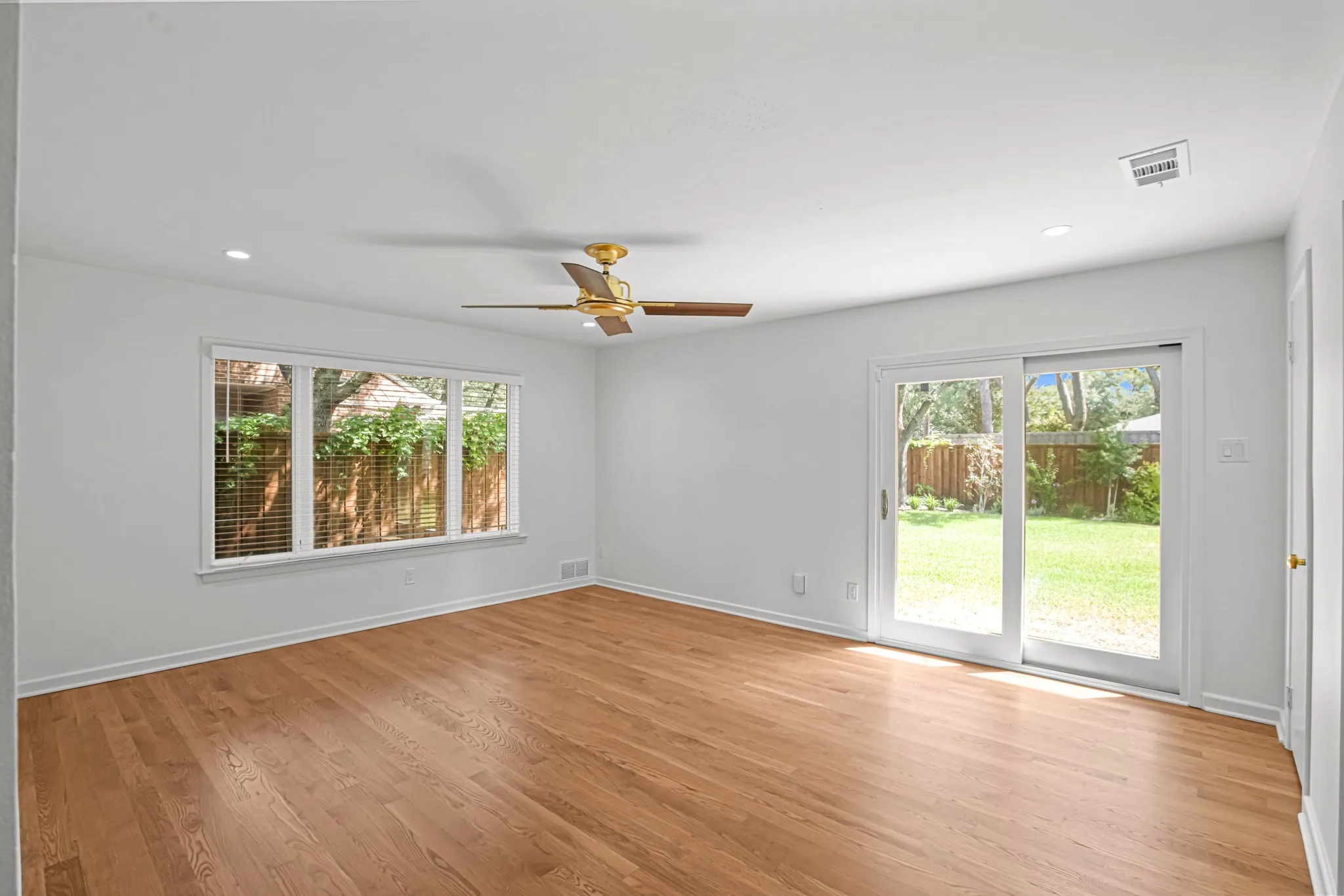 Let the sunshine in every morning and enjoy your own private view of the lushly landscaped backyard!