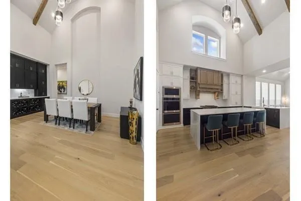 Hardwood flooring throughout, vaulted ceilings, exposed beams, custom built-in cabinetry, and a kitchen island with seating