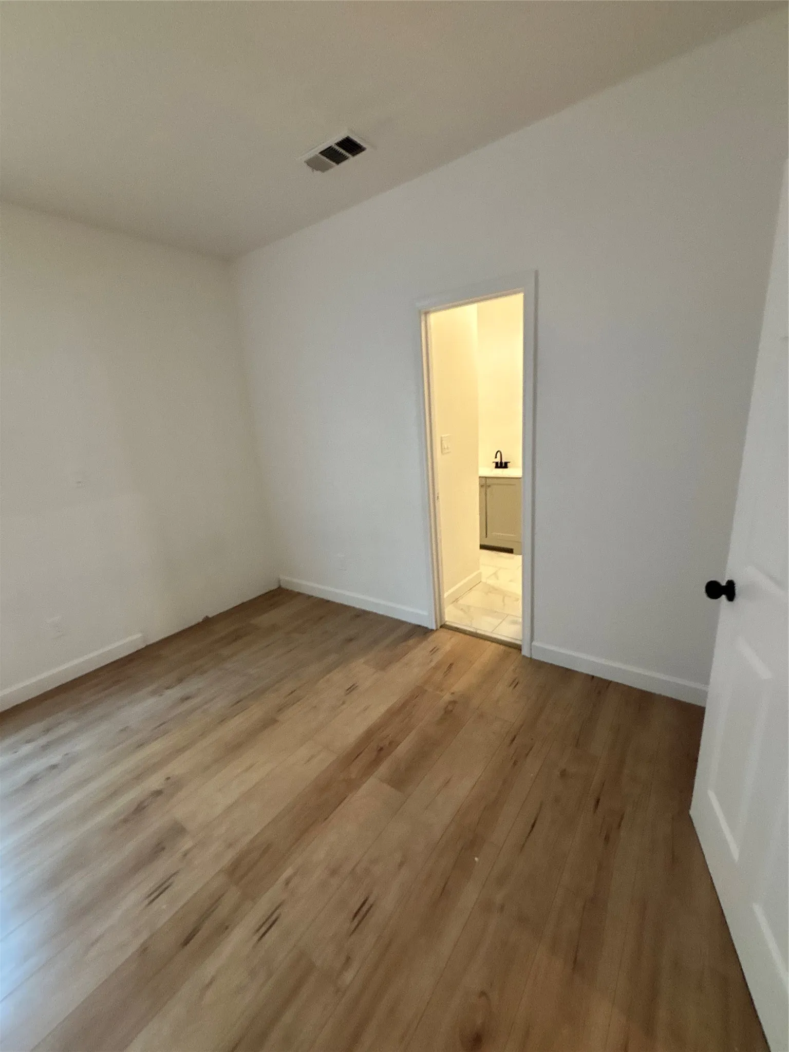 Wood-finish flooring throughout
