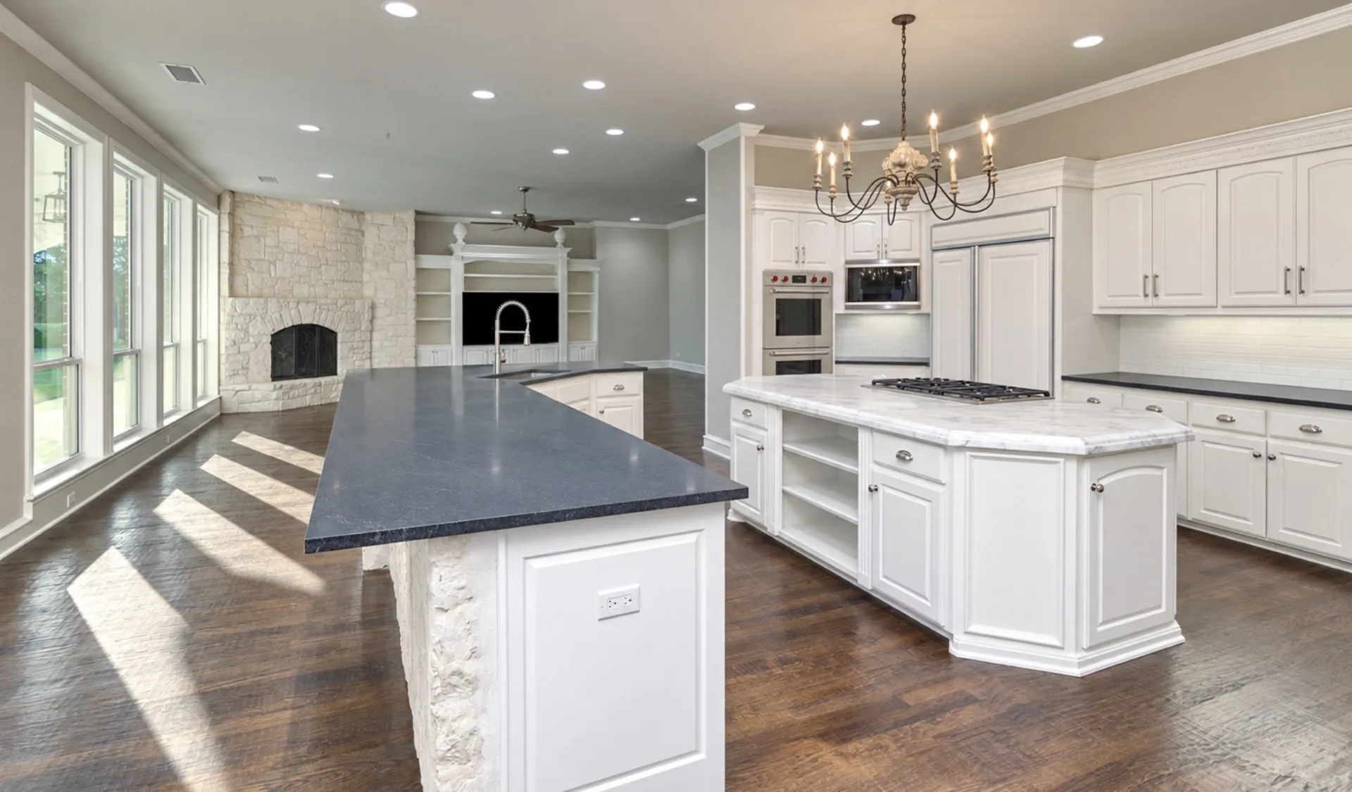 Open concept  wolf appliances,double islands