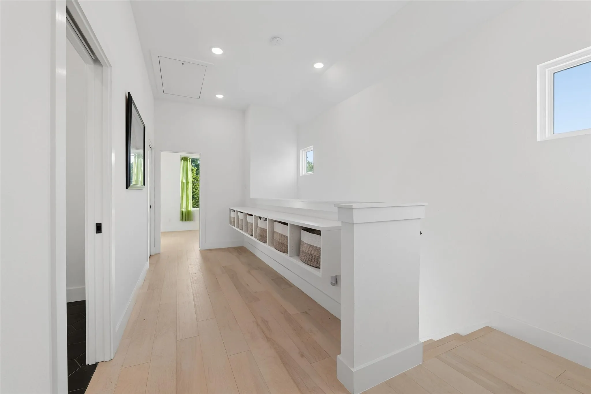 Upstairs hallway w/storage