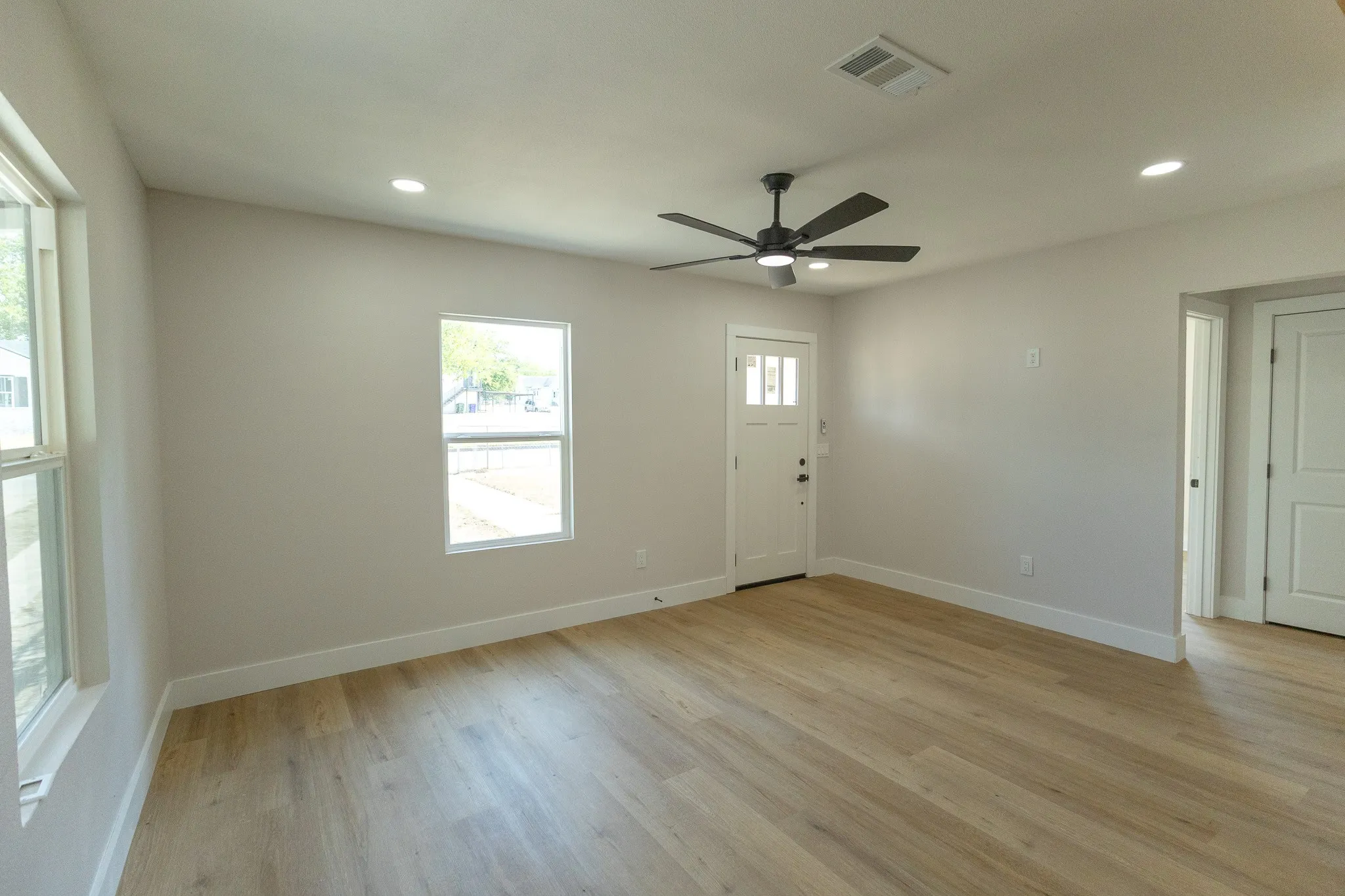 Recessed lighting and a ceiling fan with integrated lighting
