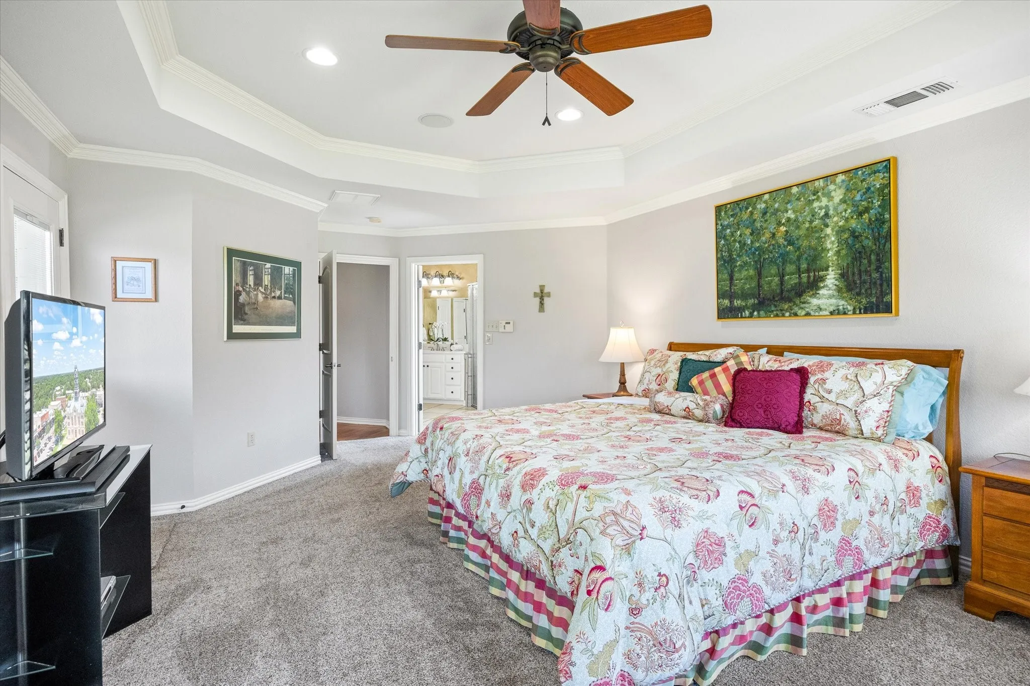 Split floor plan with private primary suite and ensuite bath