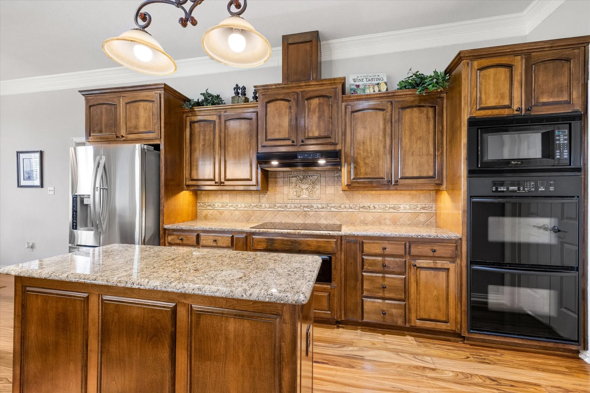 Cooks kitchen with double ovens, warming drawer, wine fridge and lots of storage and prep space