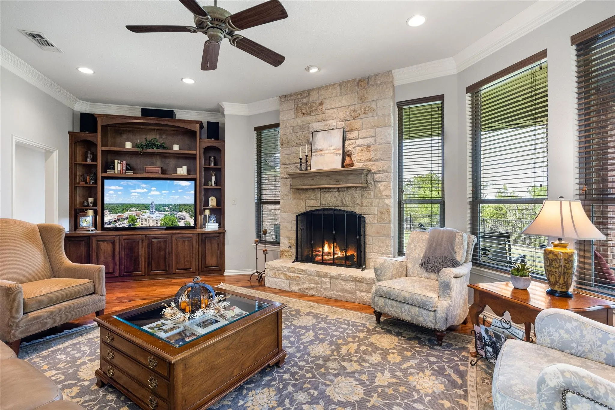Warm and inviting living area with a wall of windows