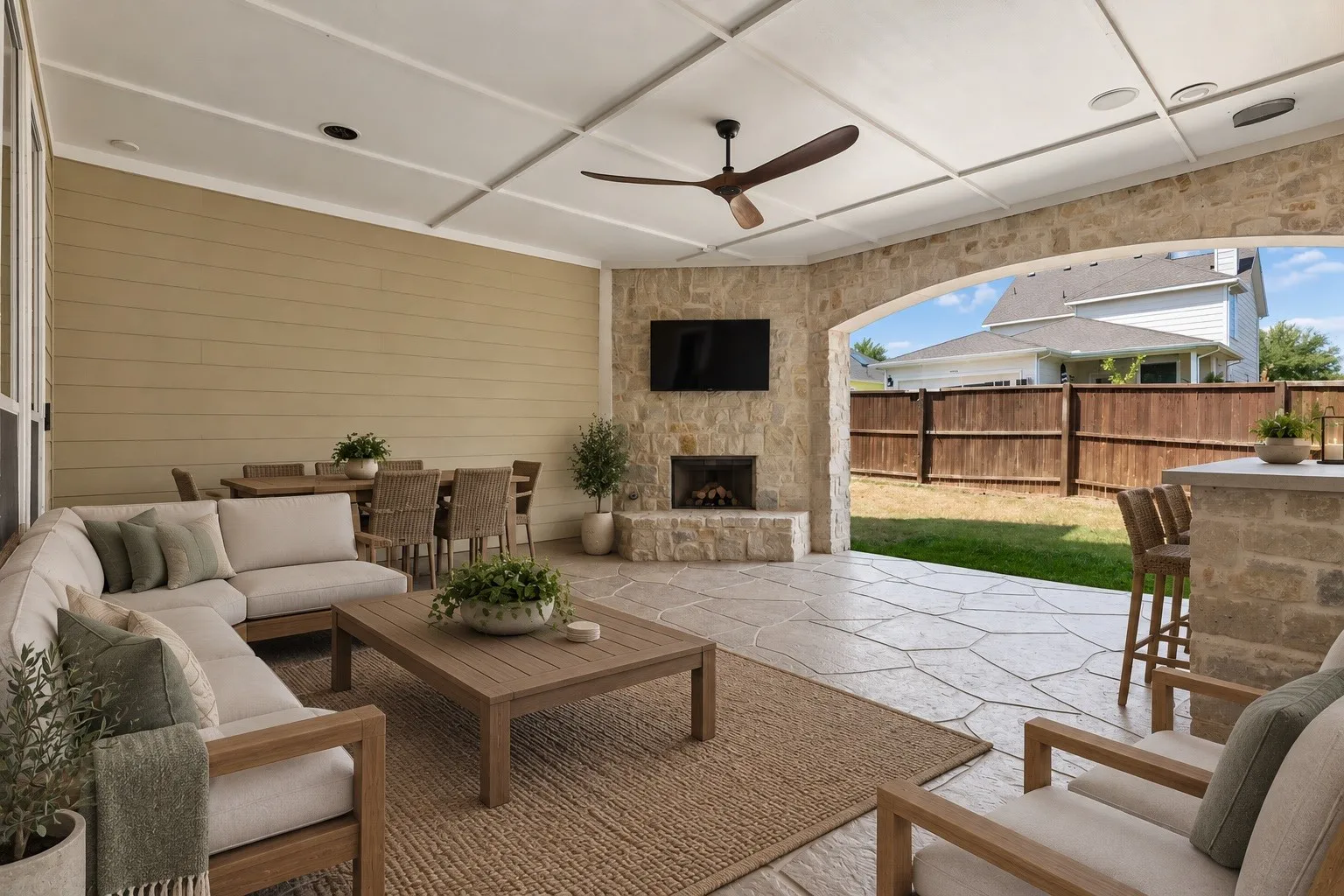 Beautiful covered patio made for entertaining virtually staged