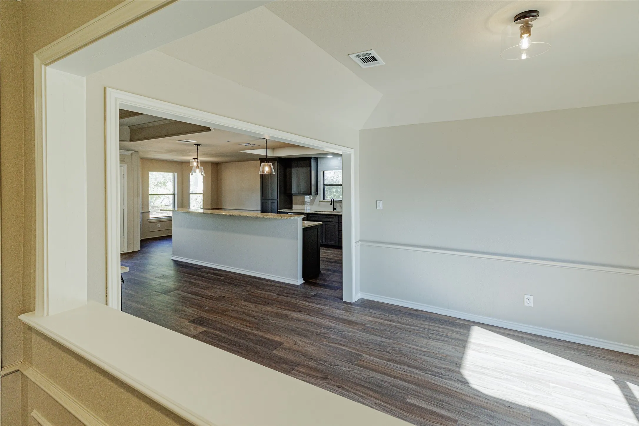 Looking into formal dining standing at the entrance.