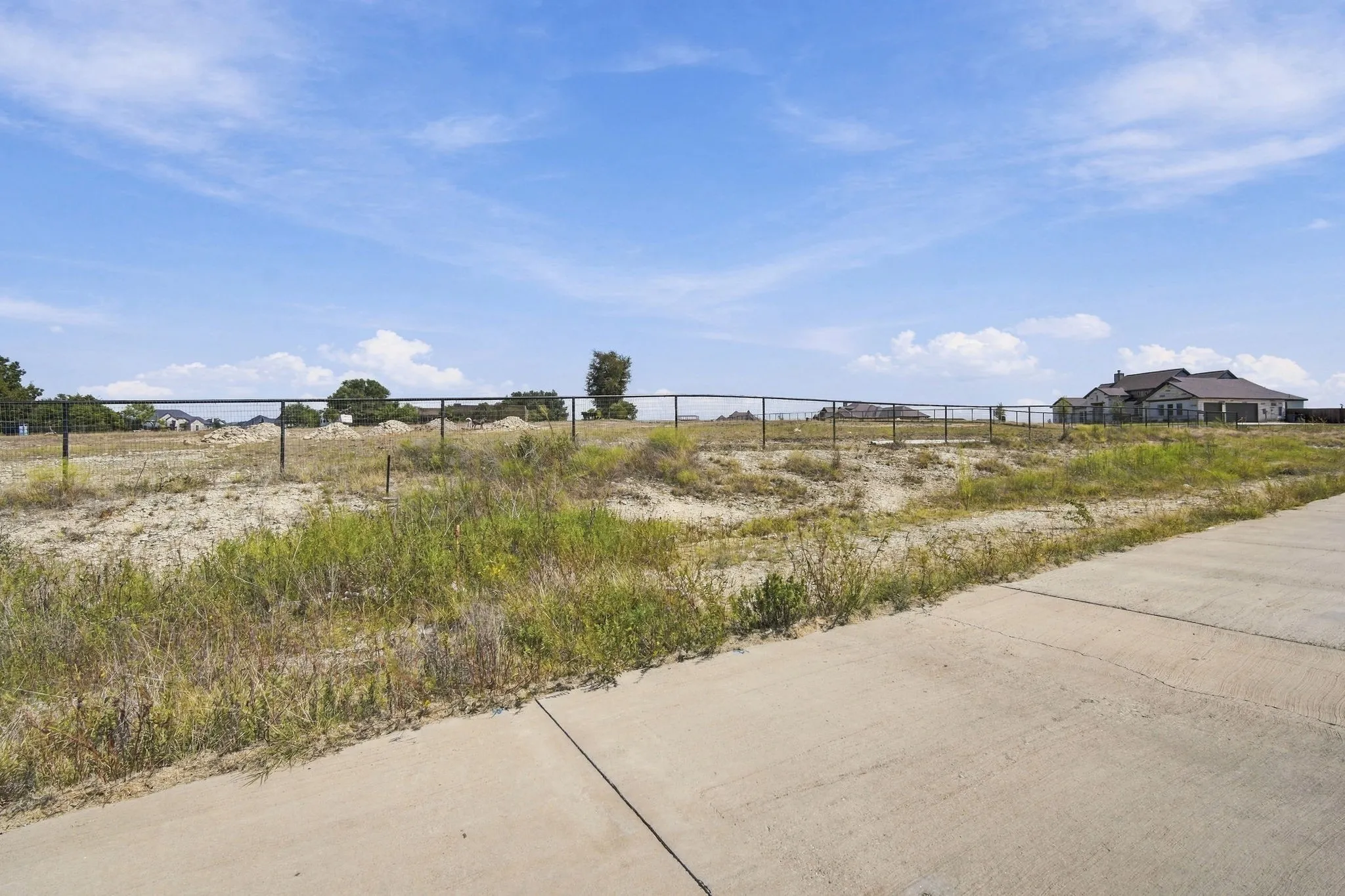Metal fence on Lot 24 along Val Verde Ln.