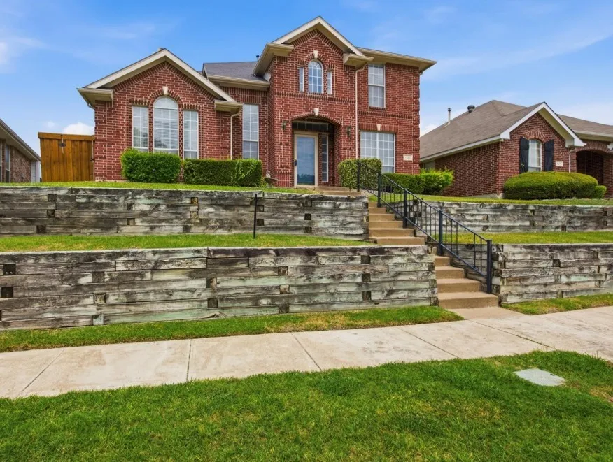 Brick exterior with gabled roof lines