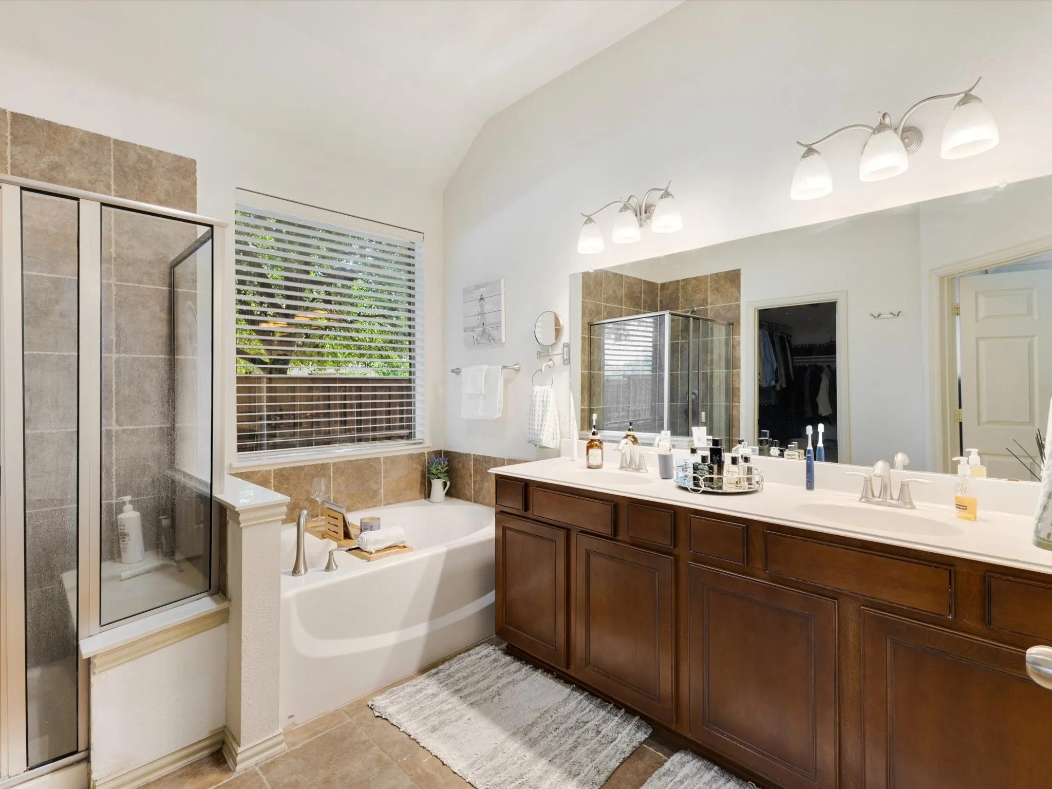 Dual vanity with extensive countertop space and integrated sinks