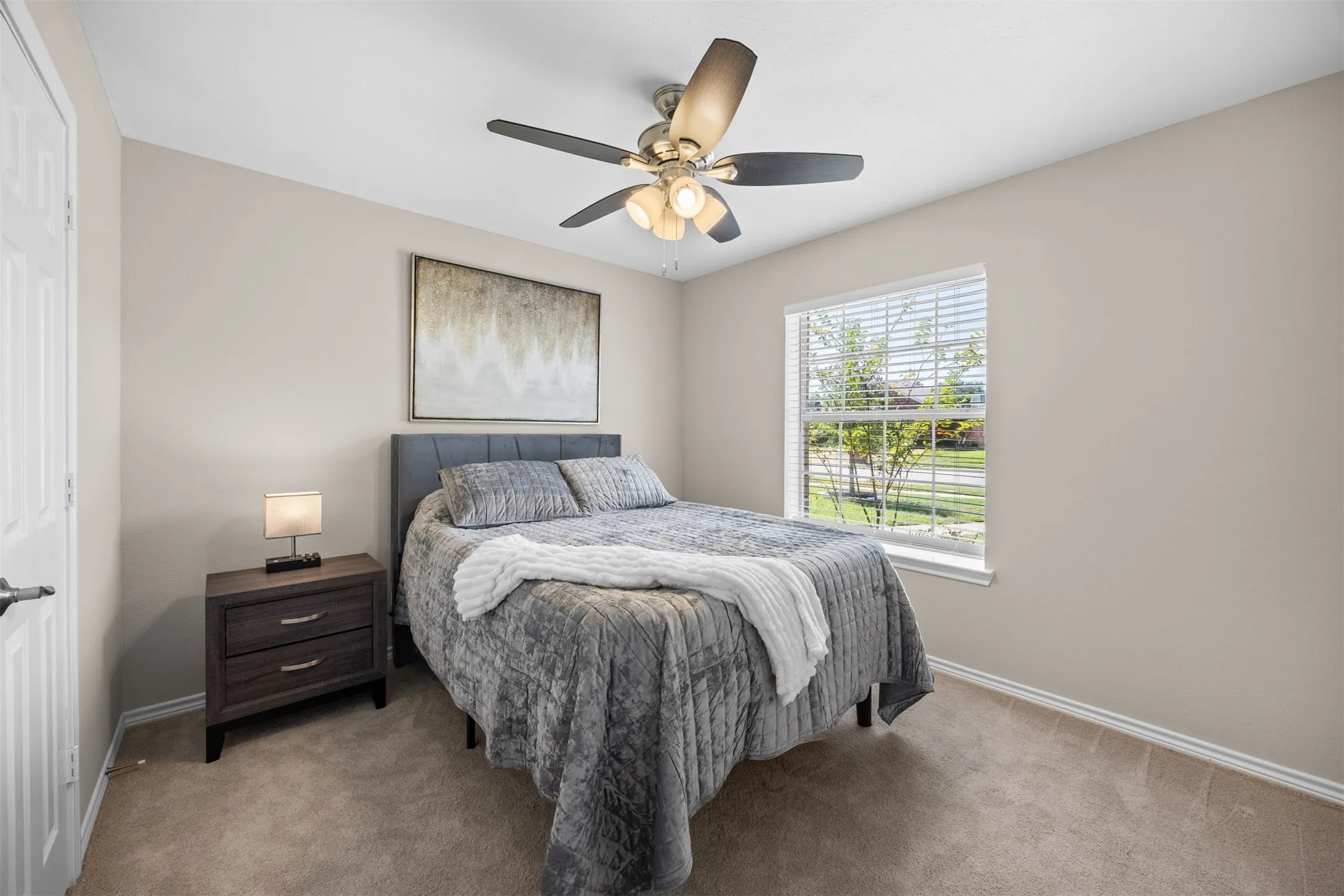Spacious primary bedroom with a private ensuite bathroom.