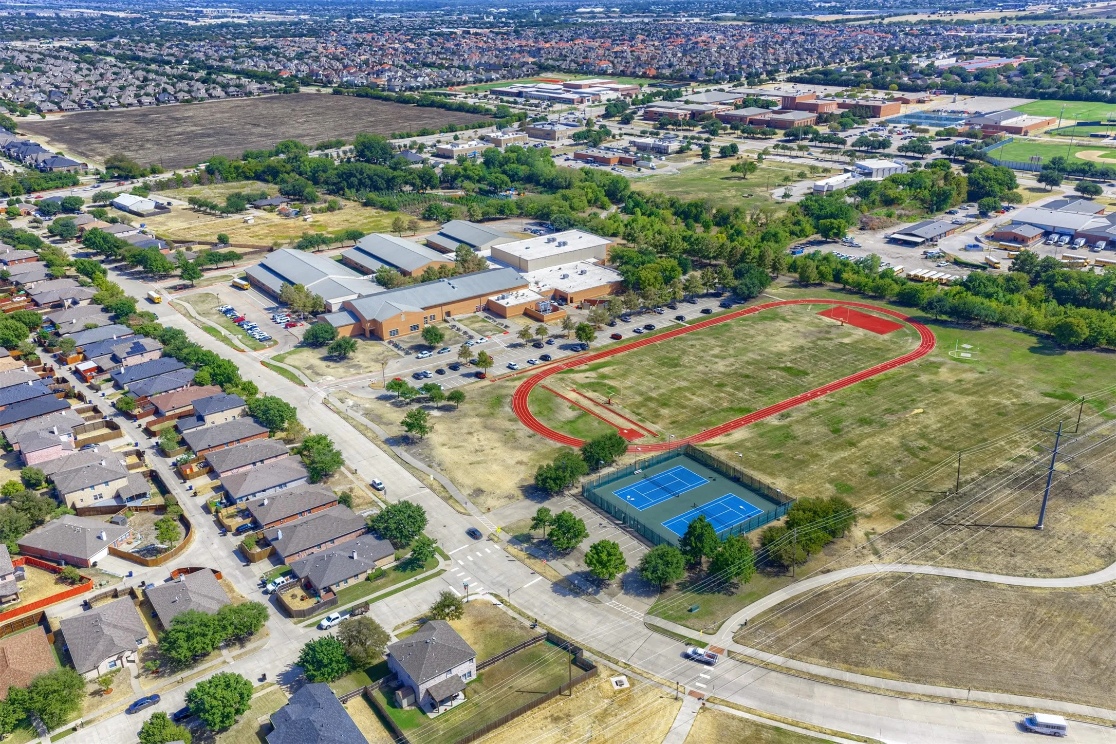 Enjoy access to the Preston Lakes community pool and neighborhood amenities.