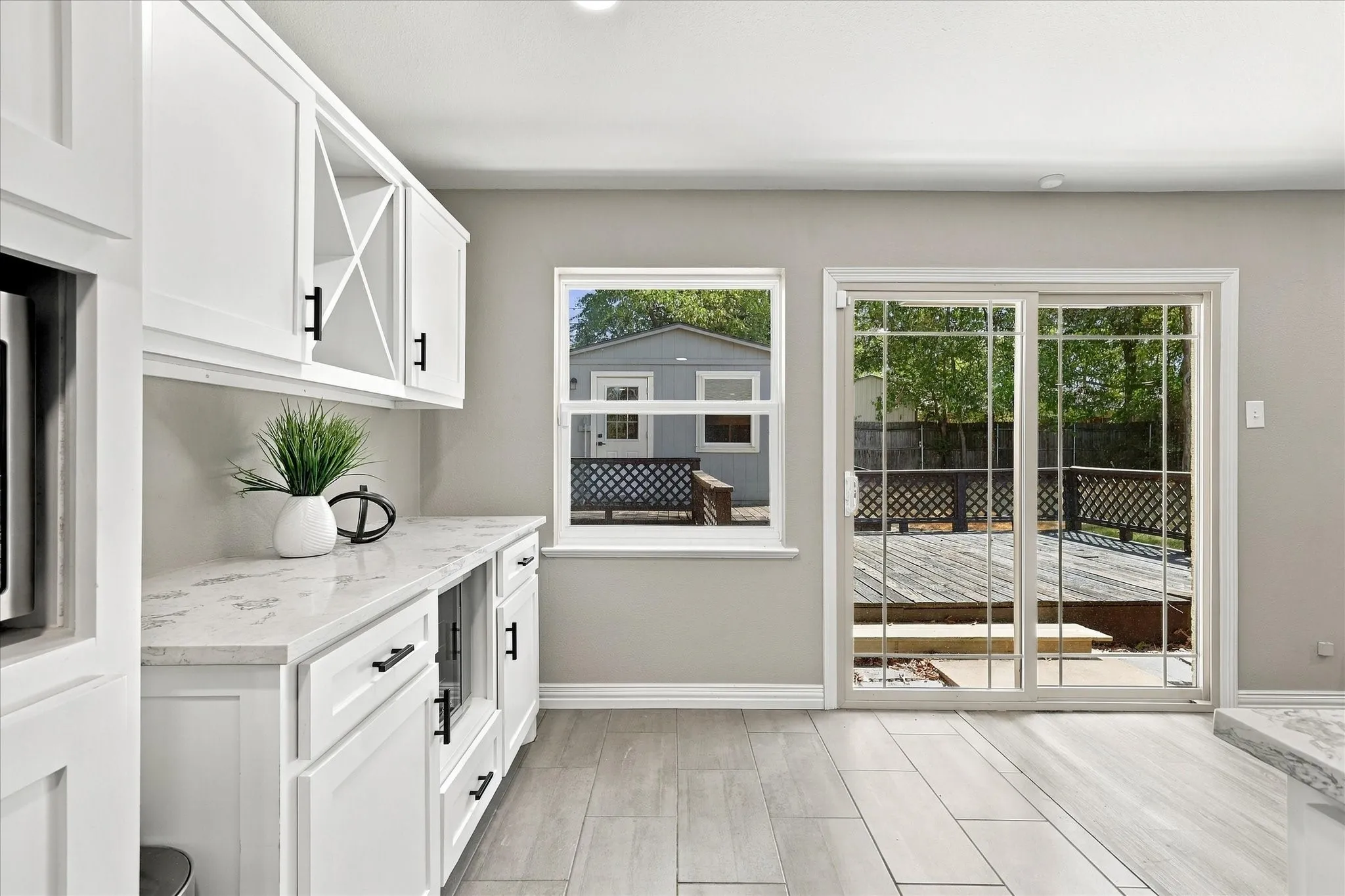 Breakfast area off kitchen showcases new windows.