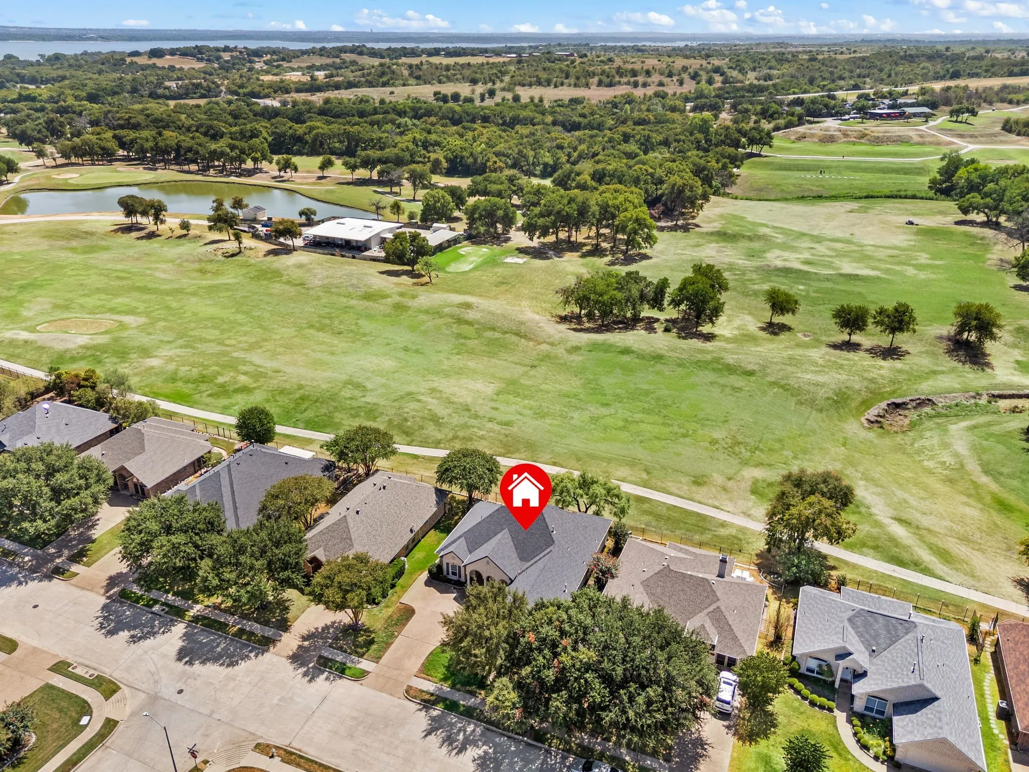 This house sits in the middle of the 6th Fairway of Whitestone Golf Course