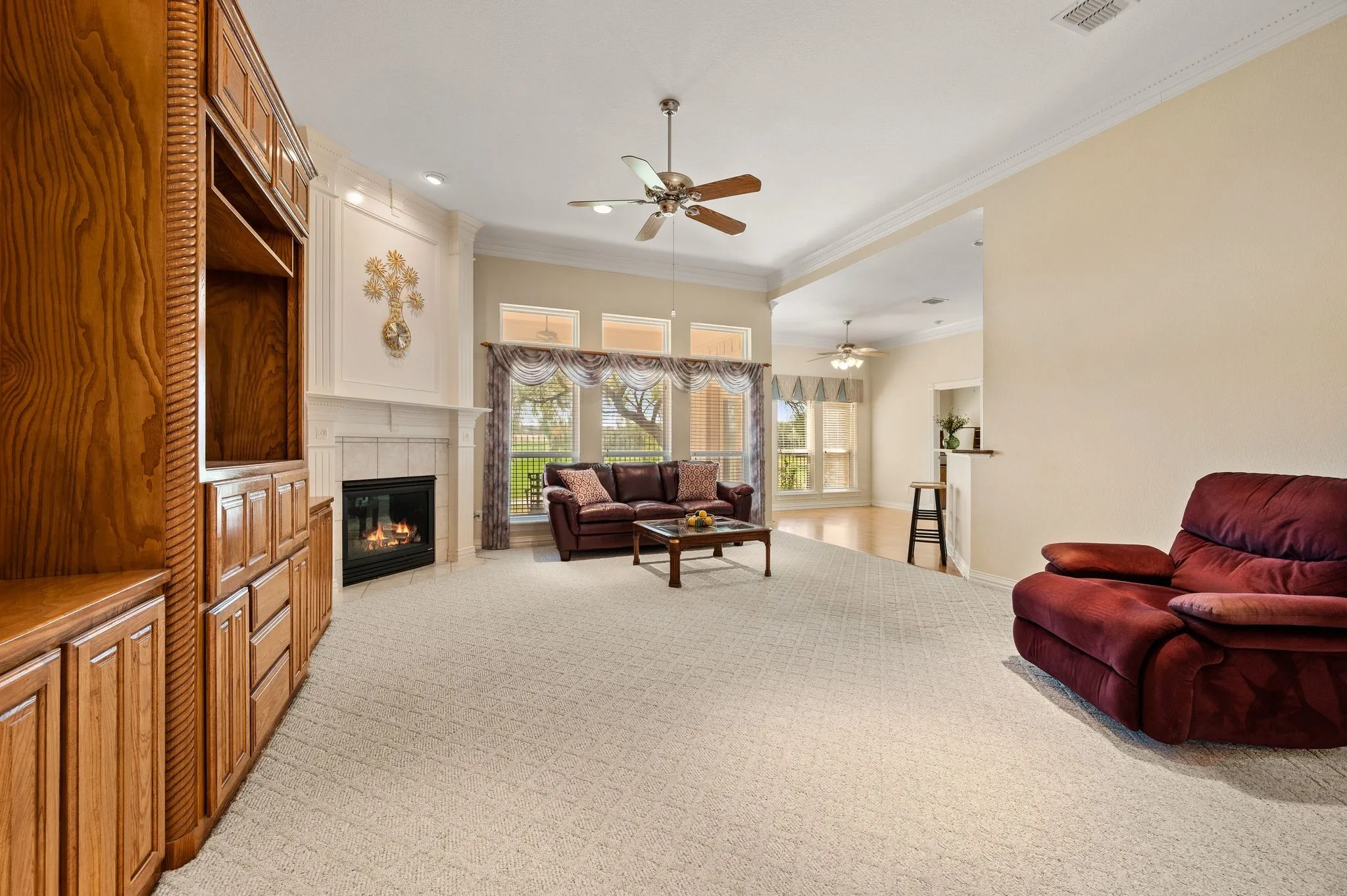 Bright Living room with view of the golf course