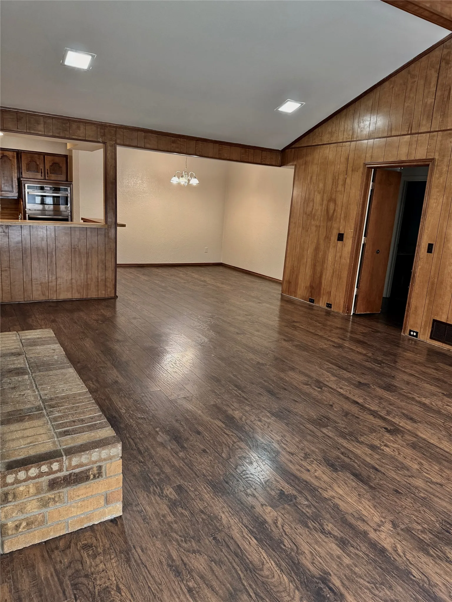 Spacious living area is open to the kitchen and breakfast area.