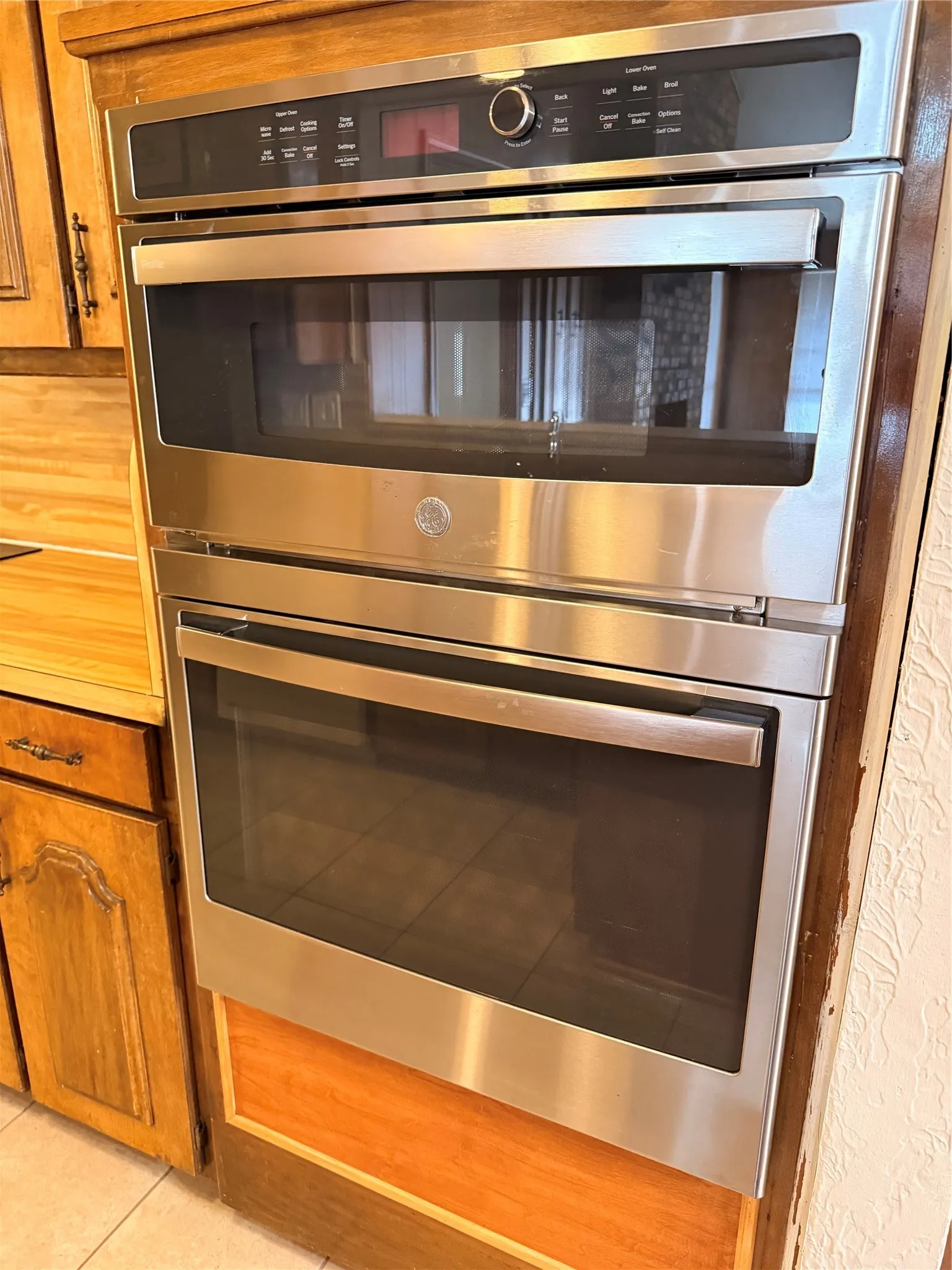 Newer appliances including a convection of and microwave.