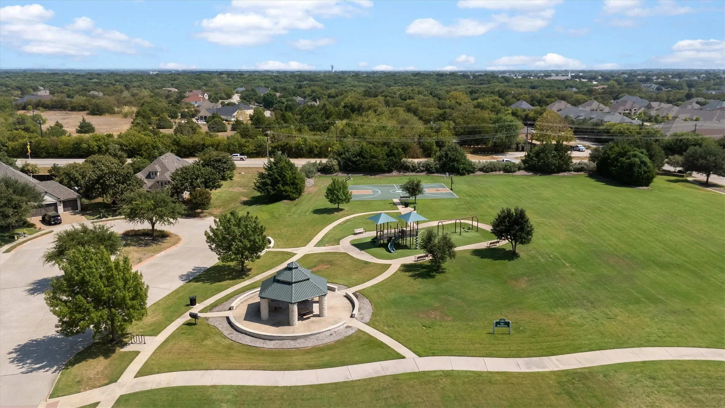 community park, playground, sports court and pavillion