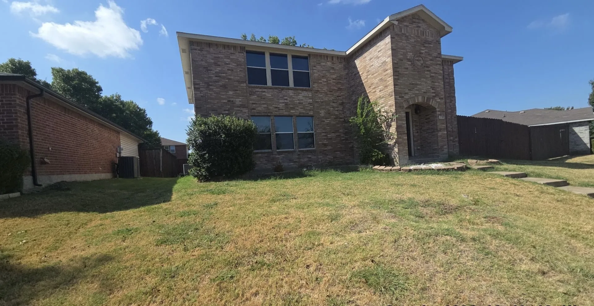 Brick exterior with multiple windows