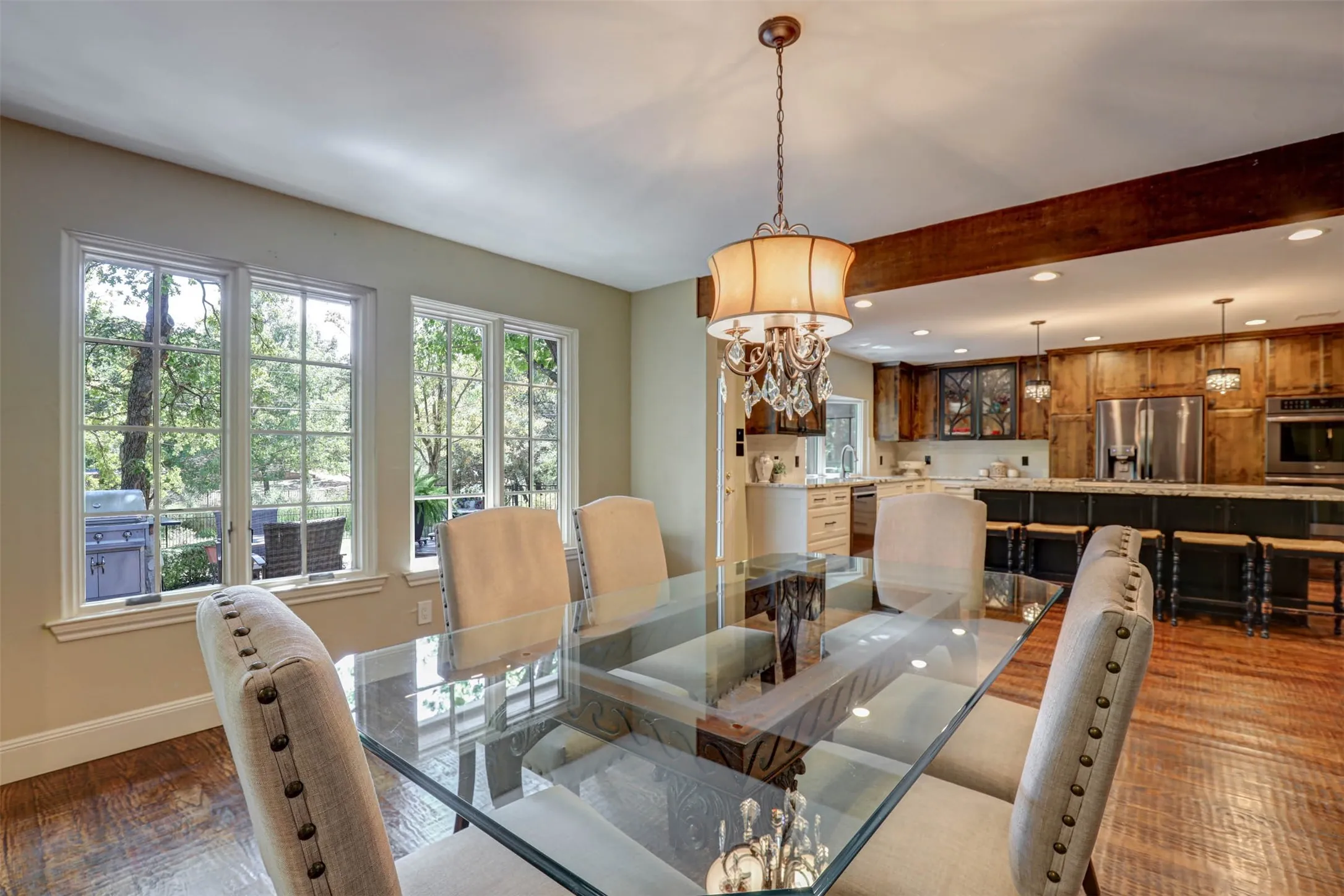 Open dining area with backyard views and seamless flow into the kitchen.