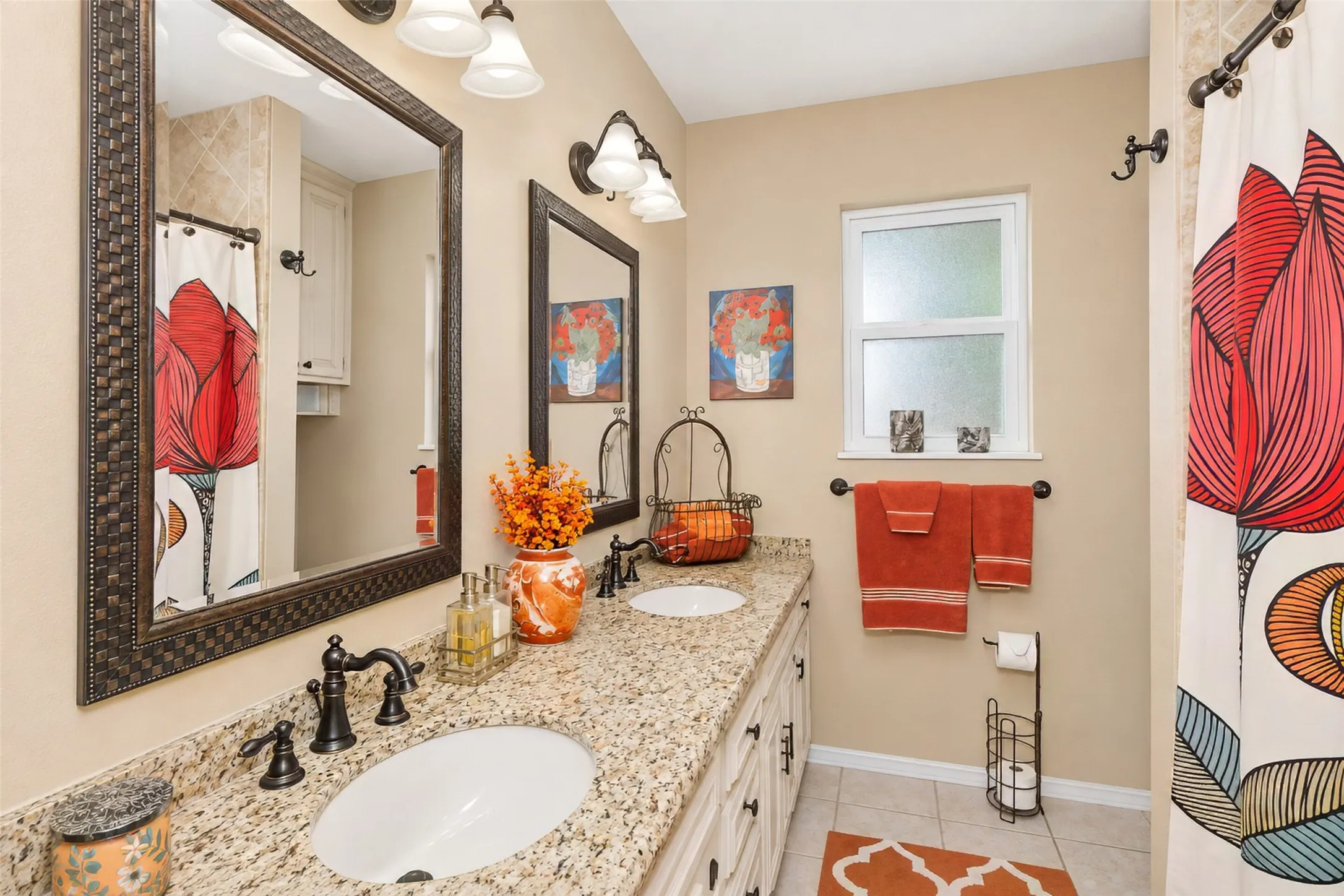 Dual vanity with stone countertop and undermount sinks