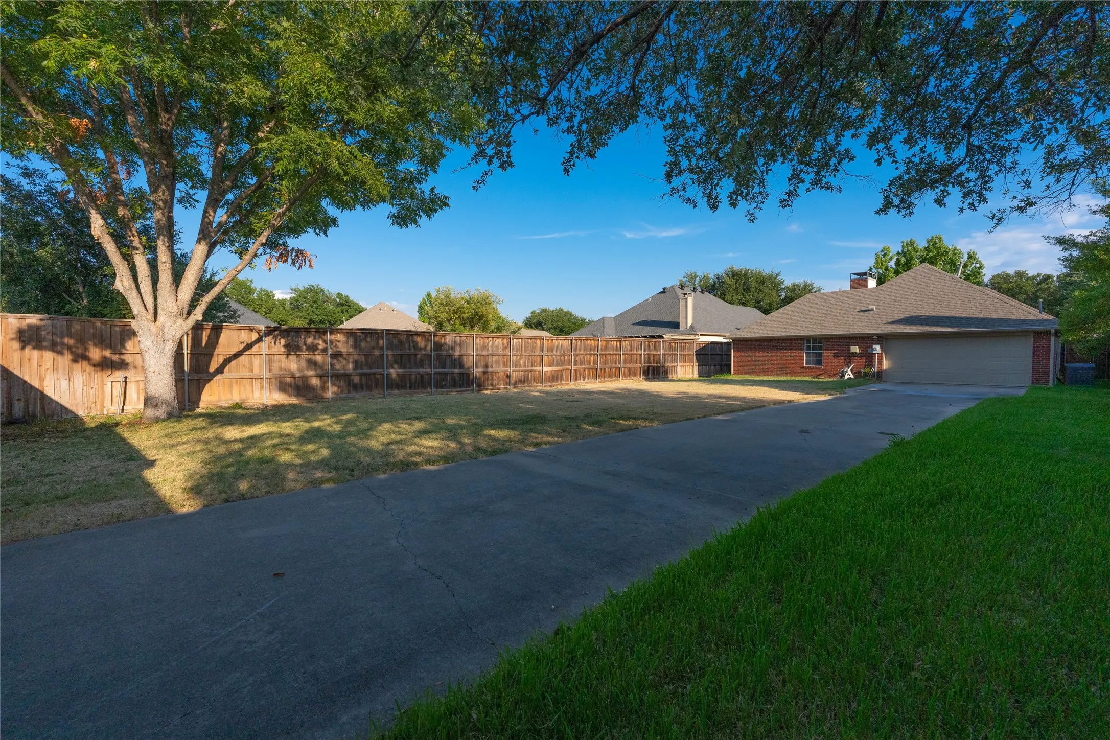 Extended driveway leading to a two-car garage