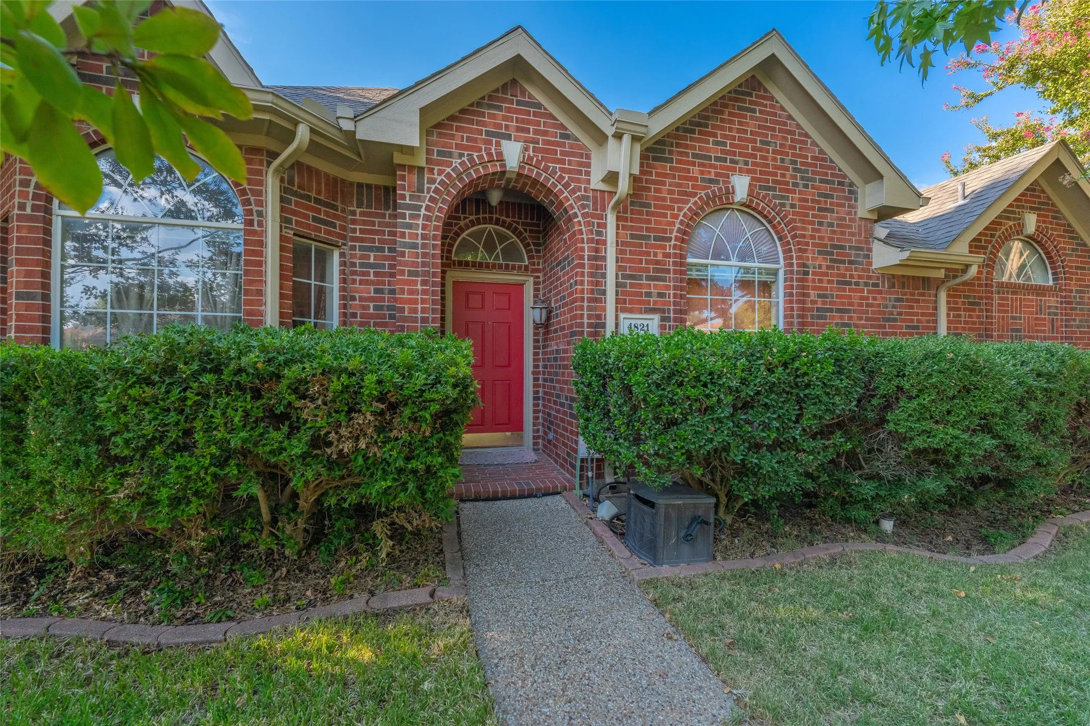 Brick exterior with gabled roof lines
