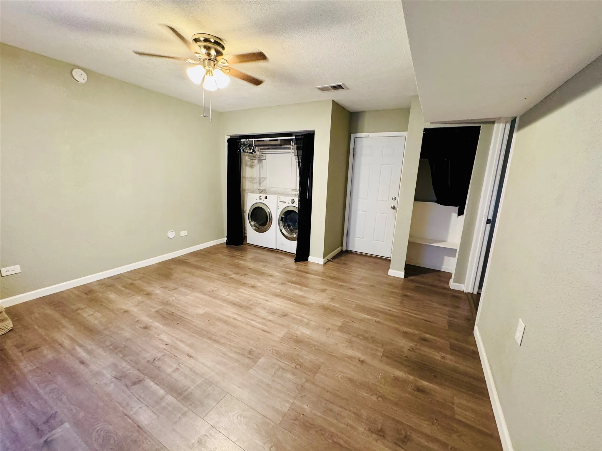 Spacious laundry room with endless possibilites