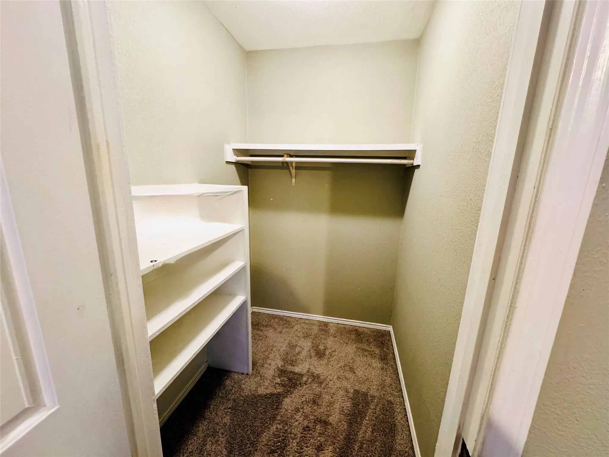 Bedroom closet with lots of storage