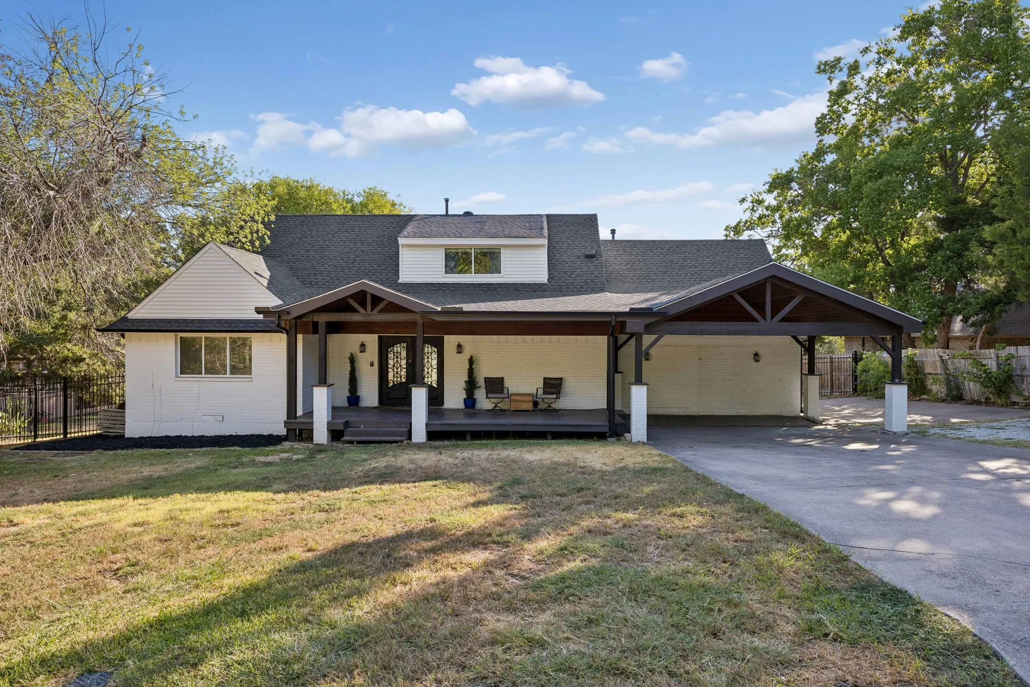 This canal front home has its own boat ramp and a HUGE fully fenced back yard!