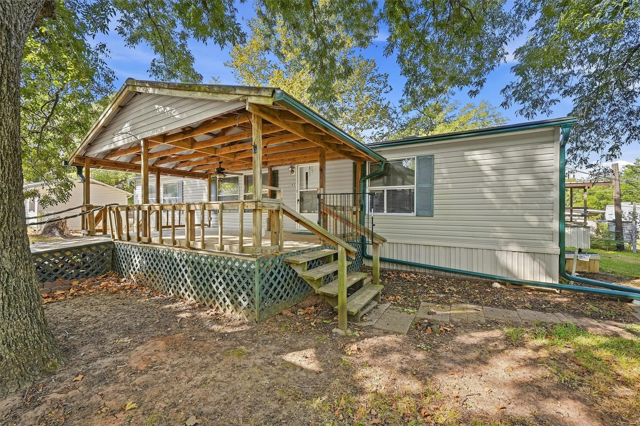 Mobile Home For Sale in Grayson County , 65 Red Sea Boulevard, Pottsboro, Texas 75076, 3 Bedroom, 2 Bathroom, Garage spaces, 1,664 Sqft, built in 2000, mls#21387473, Real Estate Agent in Pottsboro, Homes For Sale in Grayson county, Homes For Sale in Pottsboro, Realtor in Pottsboro Texas, Real Estate Brokerage Independent Realty Texas, Luminita Cordes Realtor