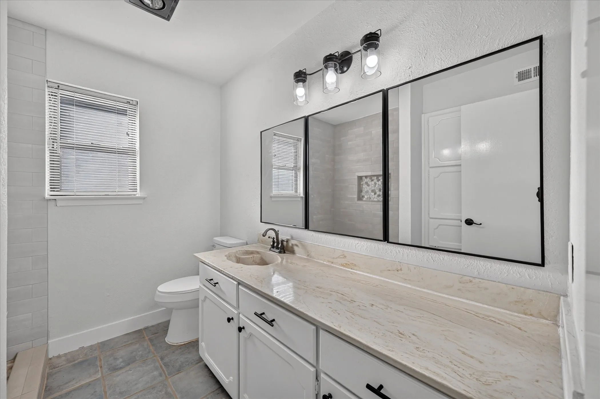 Vanity with an integrated basin and a substantial countertop