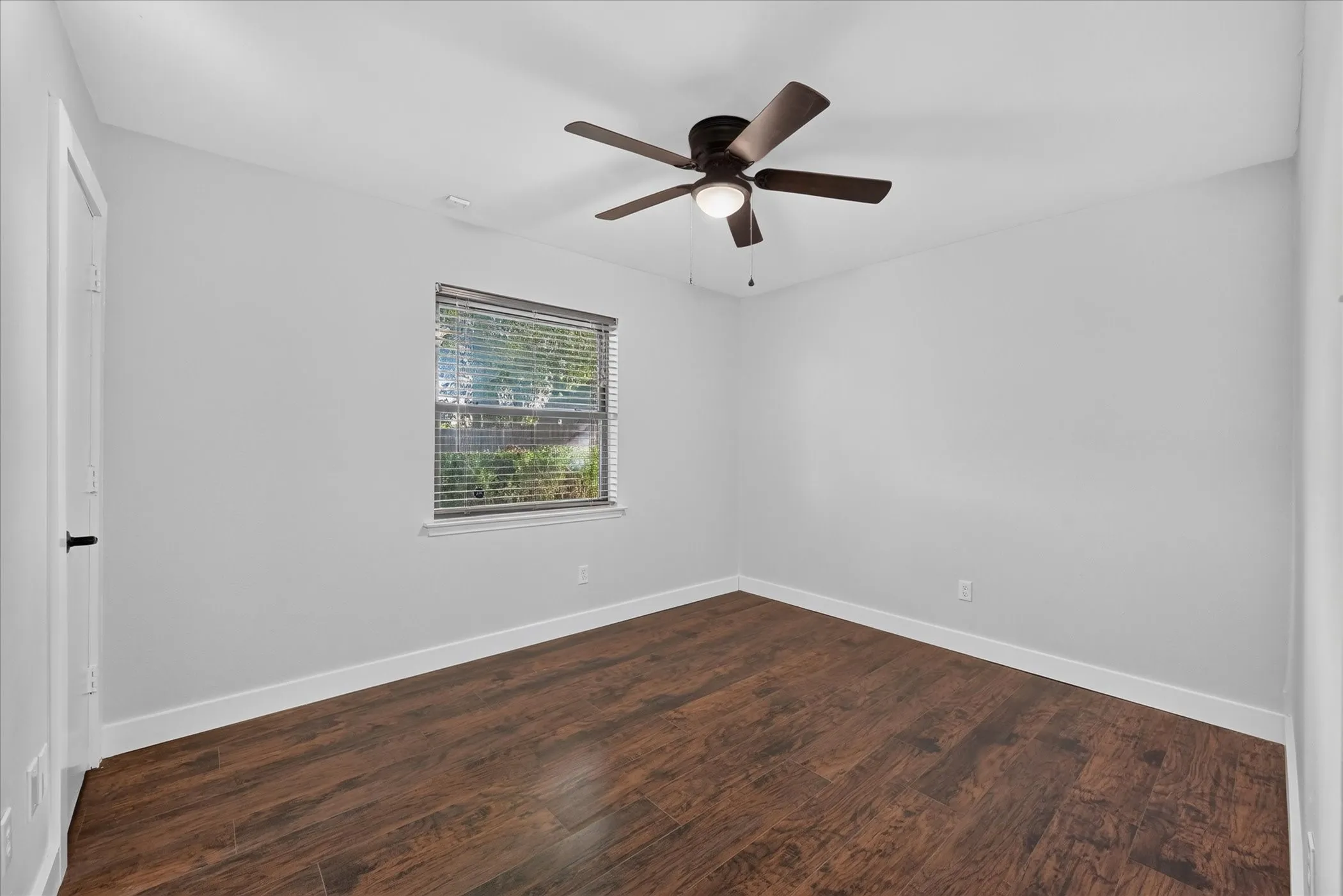 Wood-finish flooring with white trim