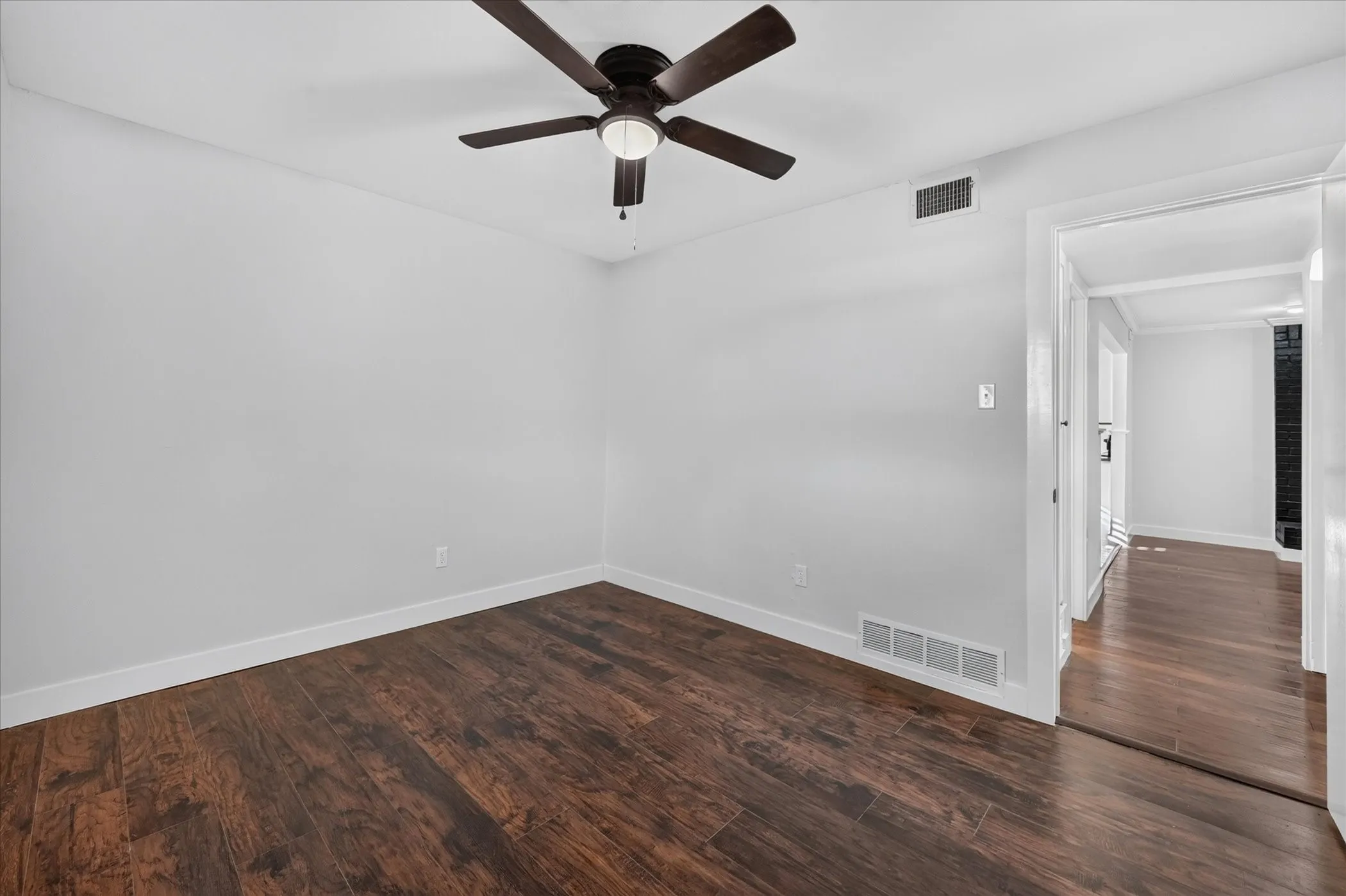 Recessed lighting, wood-finish flooring, ceiling fan, white wall finishes, white trim