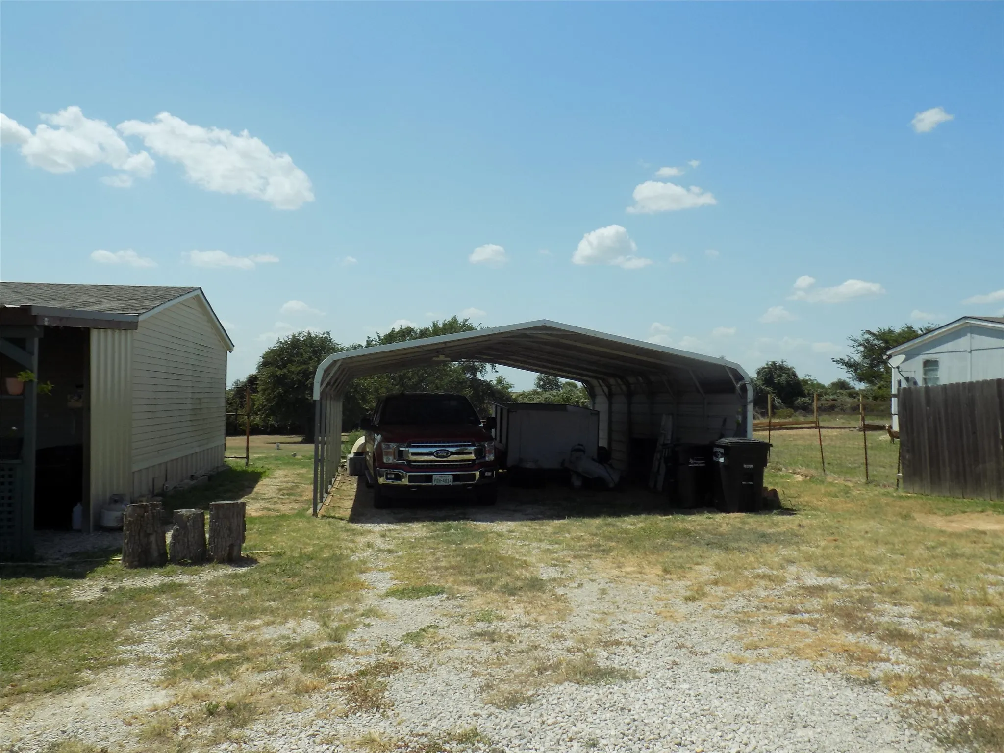 Large two-car carport.